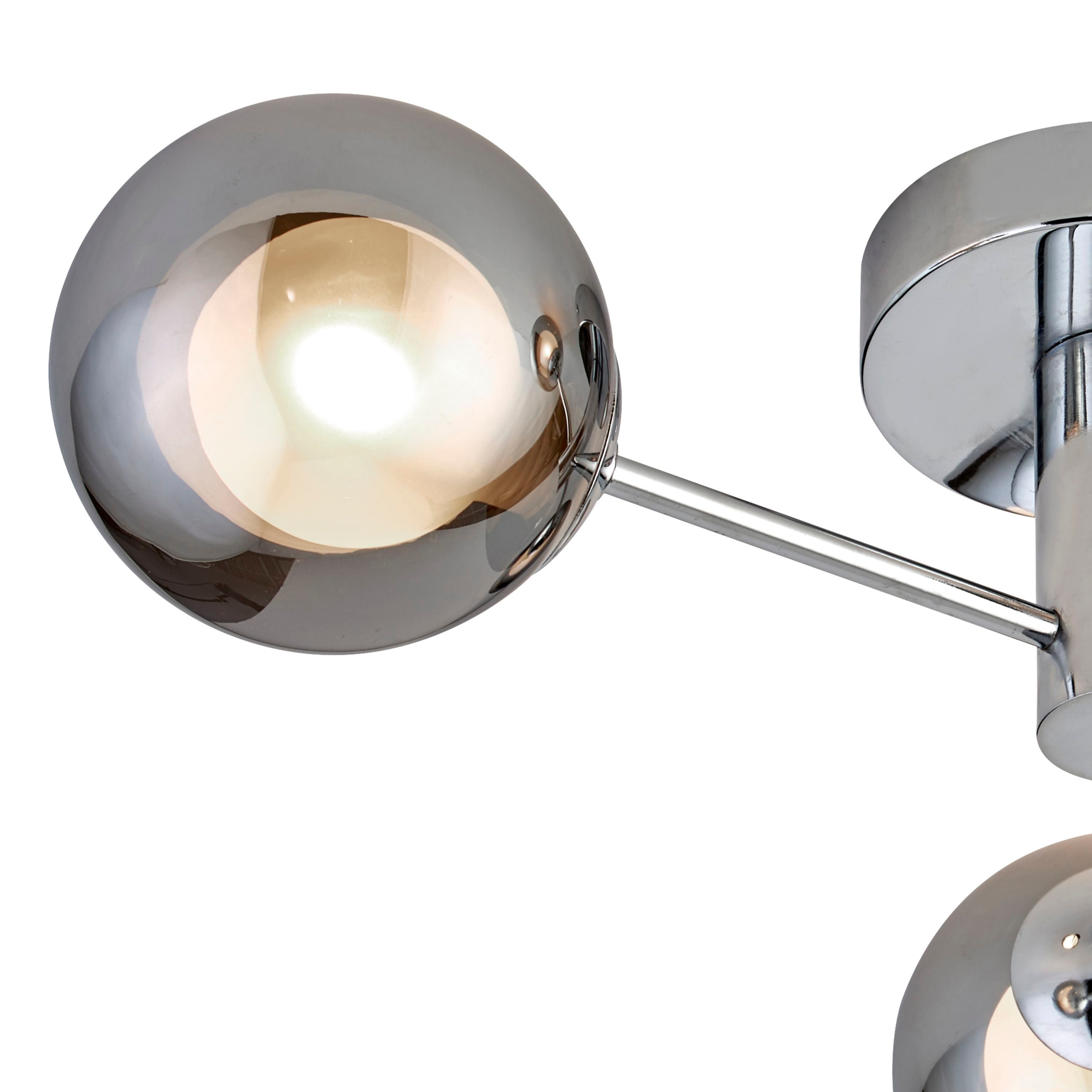 Close up of the Searchlight Oscar 3 Light Flush showing the mirrored smoked glass globe and frosted glass around the bulb