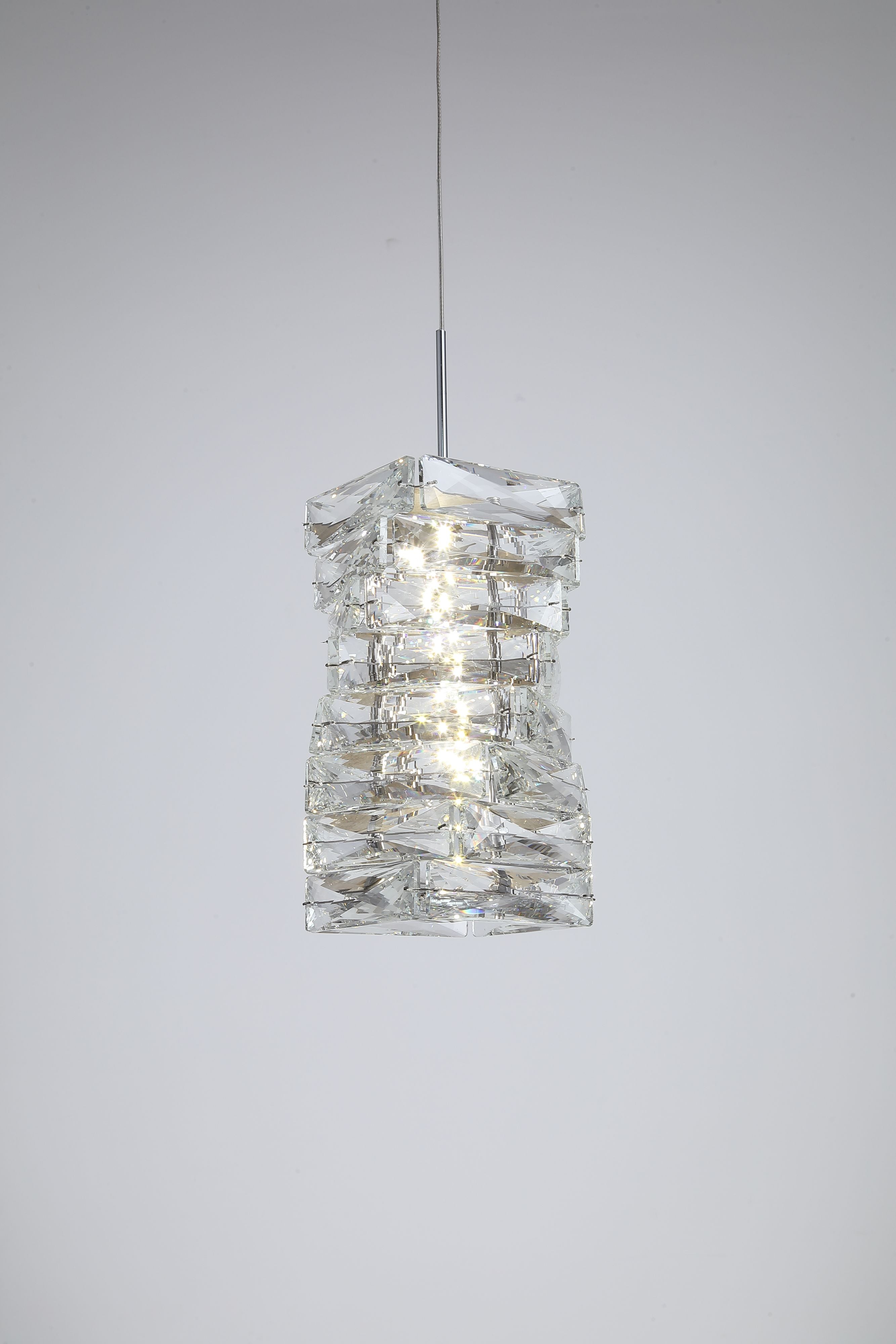 Searchlight Modena LED Pendant in chrome and clear crystal, close up of the illuminated faceted crystal shade