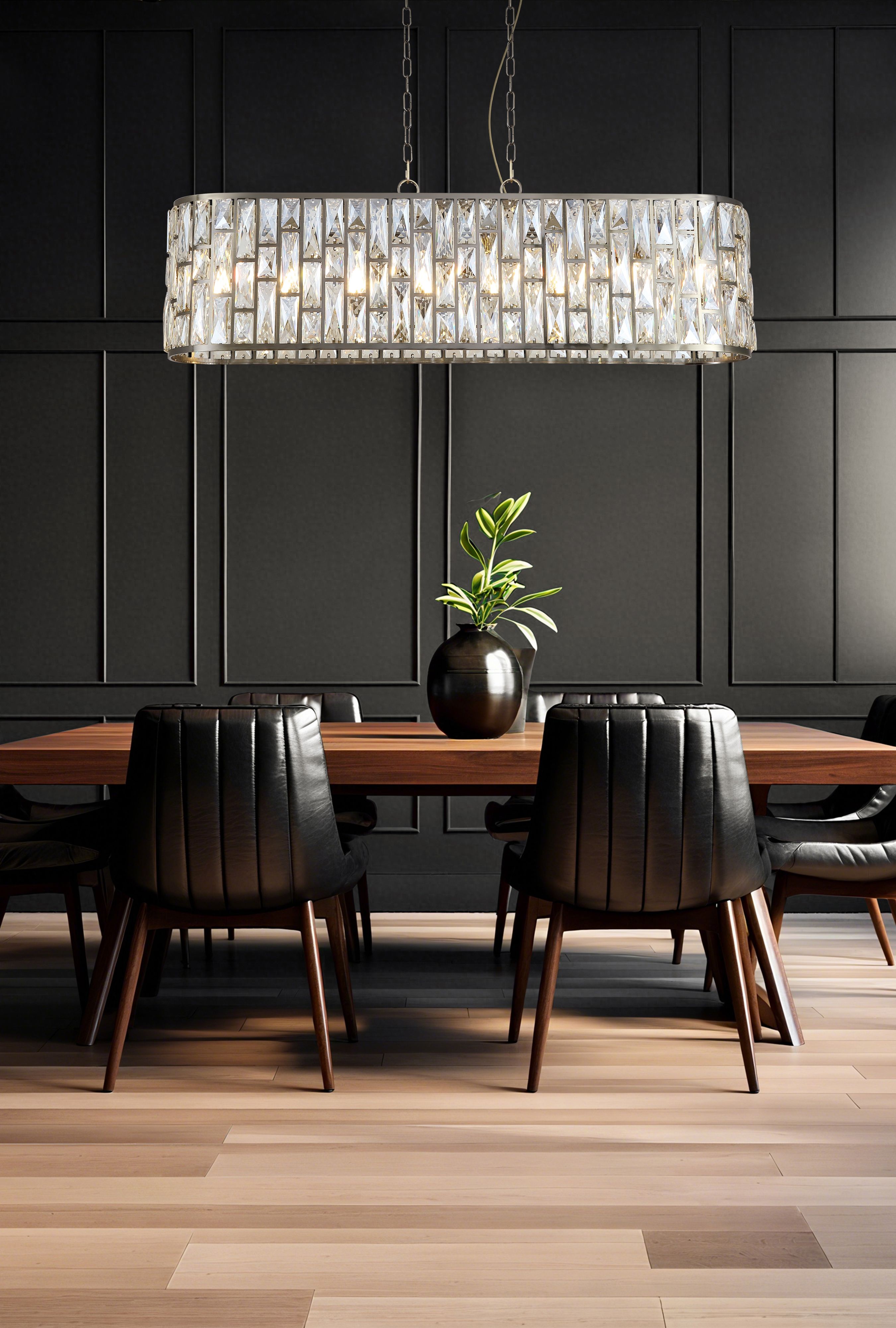 Searchlight Bijou 8 Light Oval Diner Pendant in antique brass styled above a wood dining table in a dark panelled room