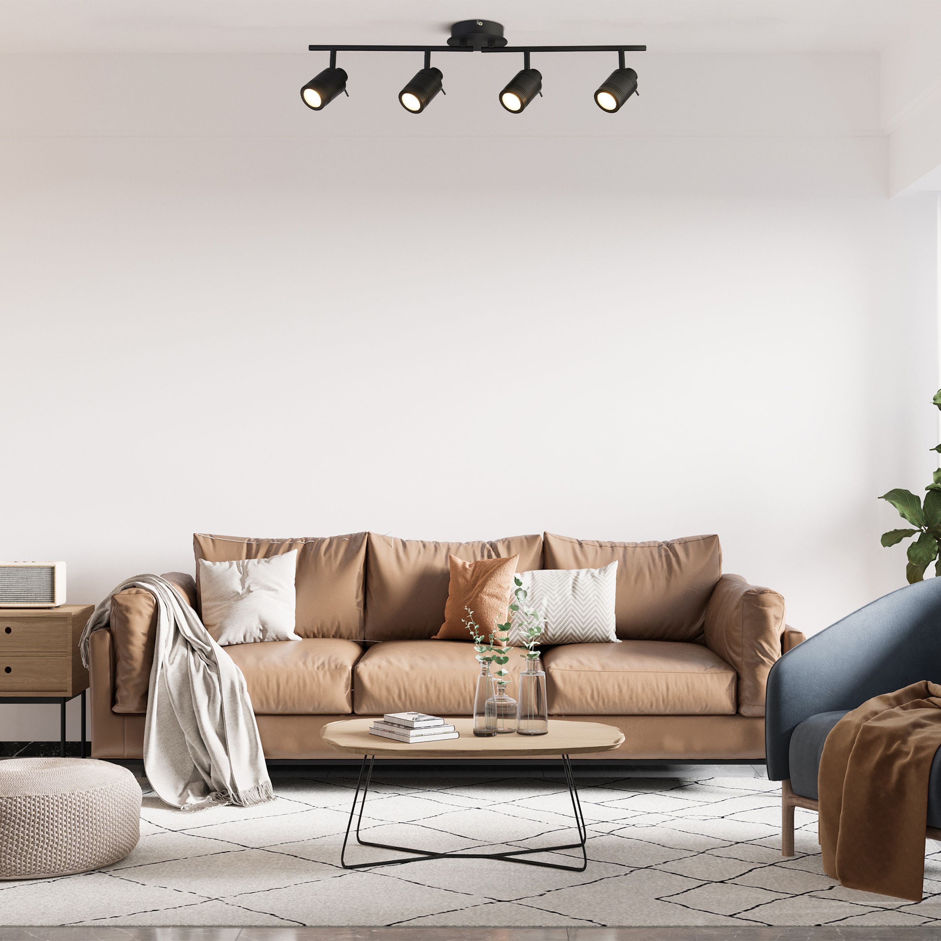 Searchlight Samson 4 light split bar spotlight installed on a living room ceiling above a sofa