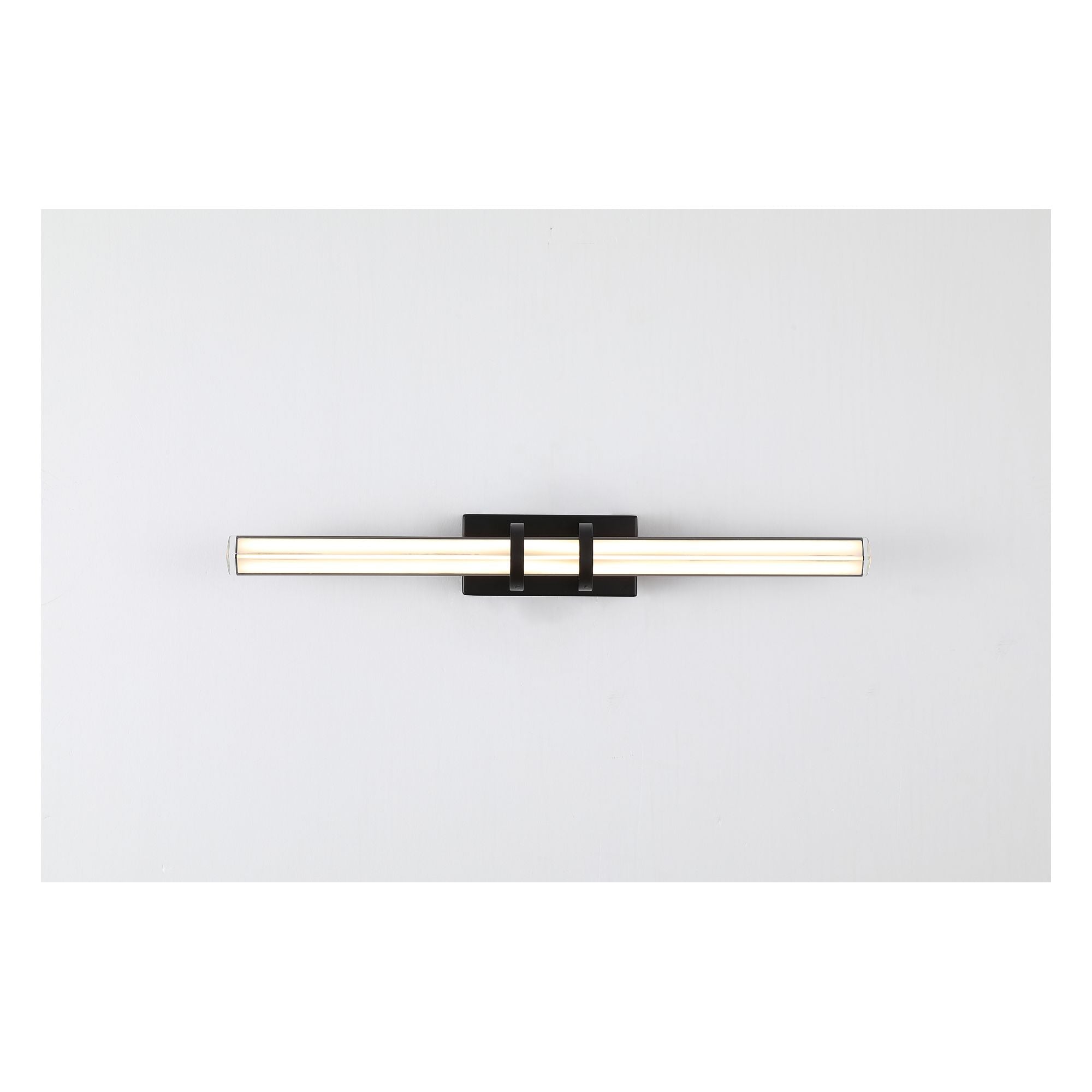 Searchlight Parma LED wall light in matt black, front on studio shot showing two lit angled glass bars held by a central black mounting plate