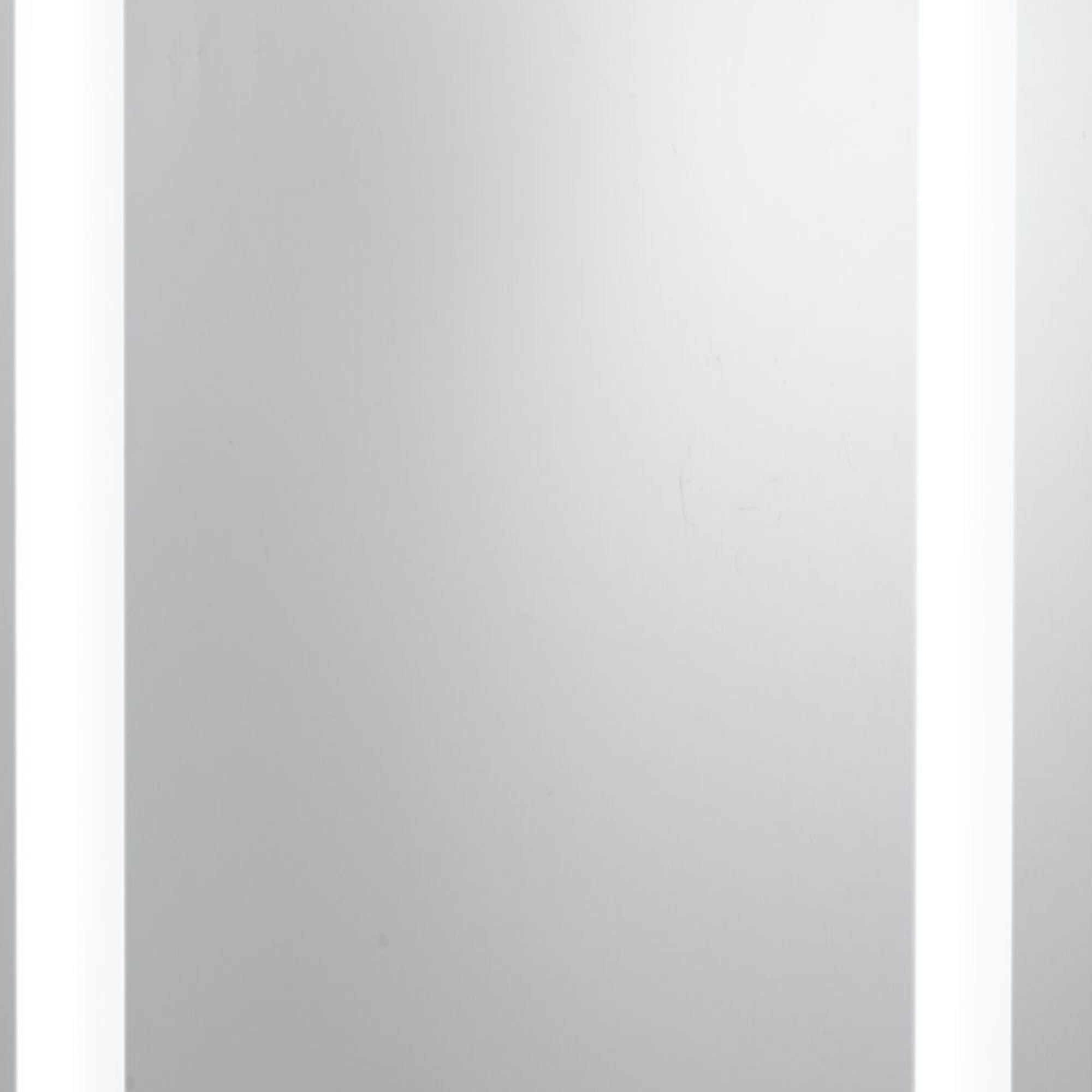 Close up of the frosted light strip and chrome edge on the Searchlight bathroom mirror