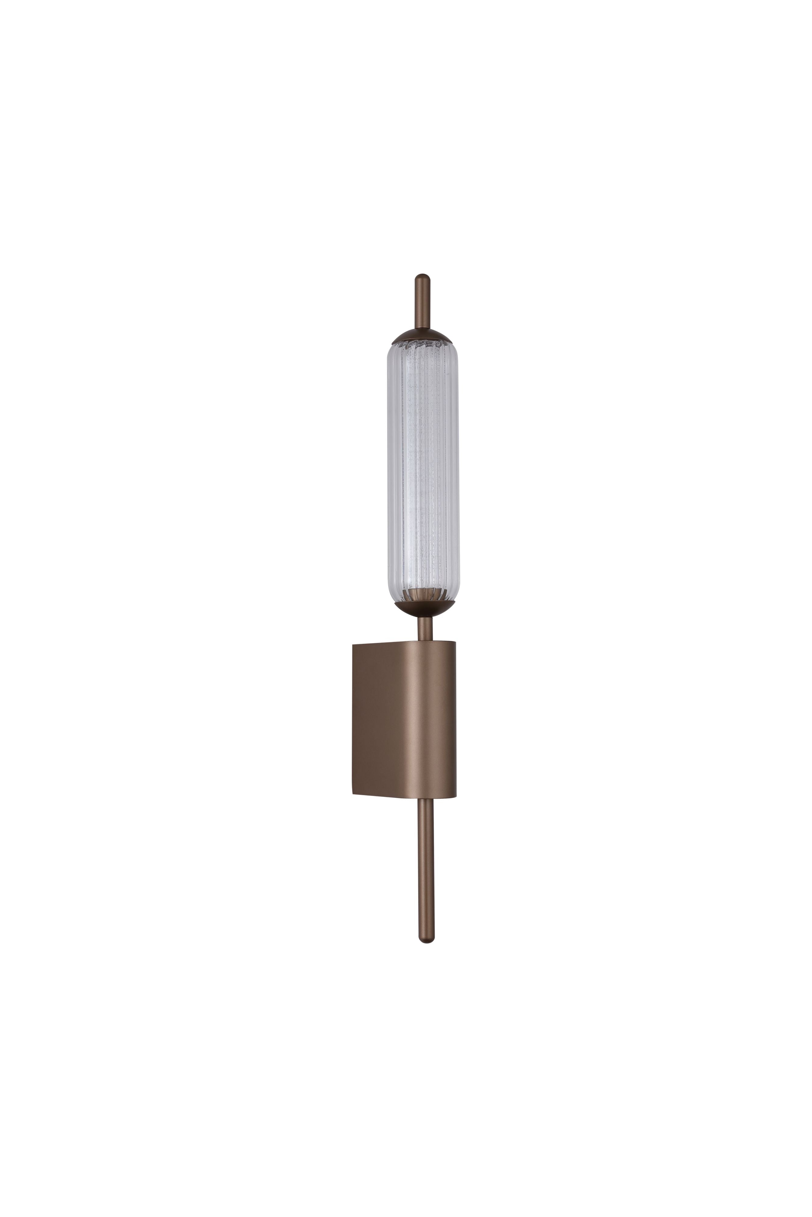 Searchlight Cattail LED Wall Lamp in latte metal, angled studio shot showing the ribbed glass tube and rectangular wall mount plate