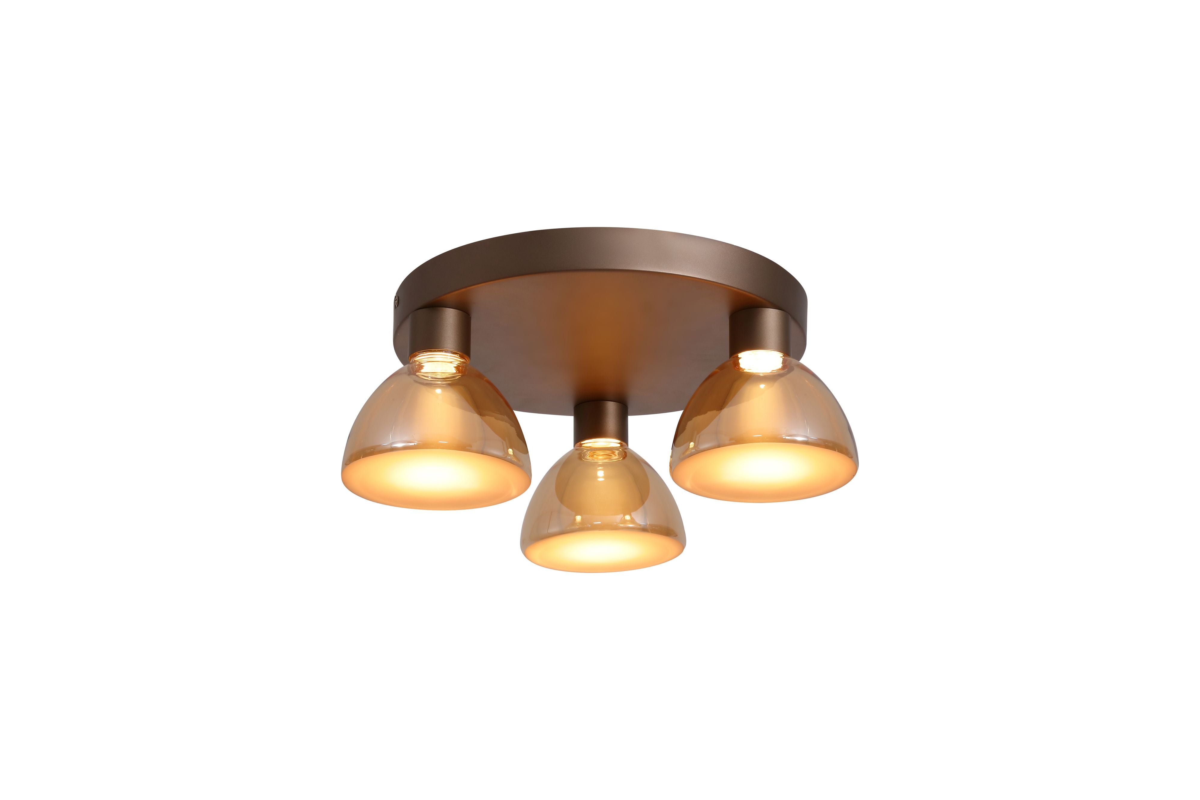 Searchlight Cannes LED 3 Light Flush ceiling light with latte bronze backplate and three amber glass dome shades, lit against a white studio background