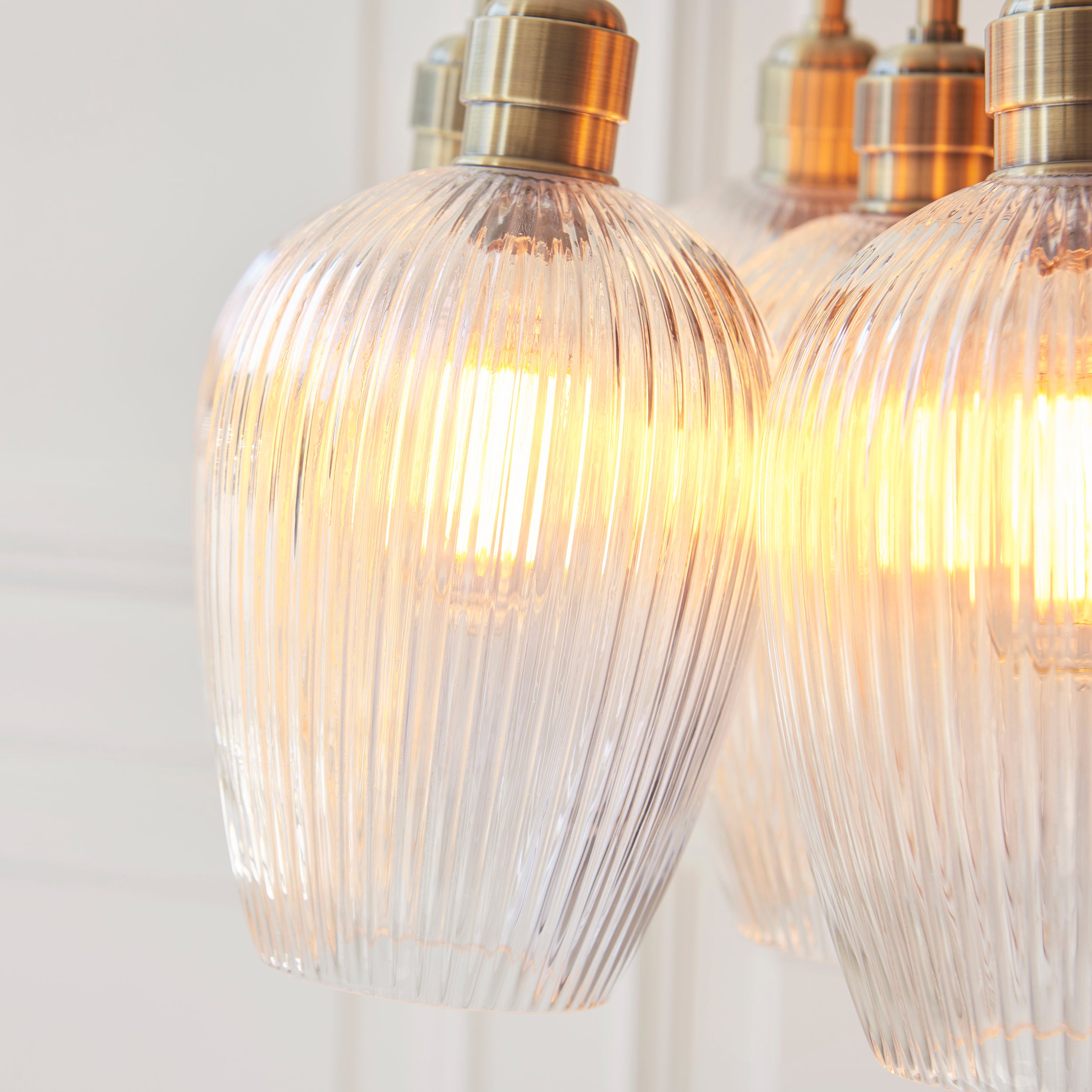 Utopia Finesse 7 Light Cluster Ceiling Pendant - Antique Brass & Clear Ribbed Glass