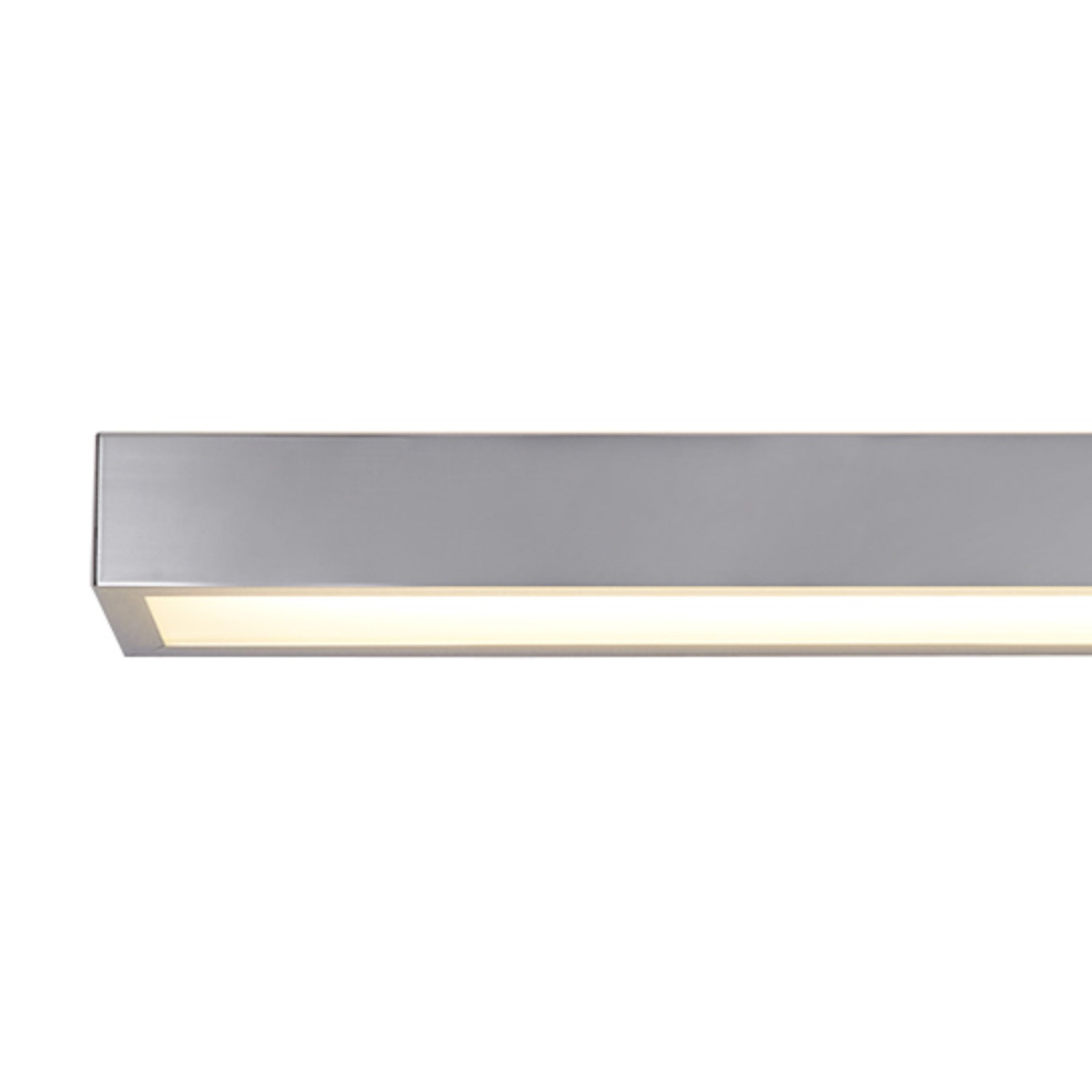 Close up of the Searchlight Venti LED wall light showing the polished chrome housing and the glowing frosted polycarbonate diffuser along its underside