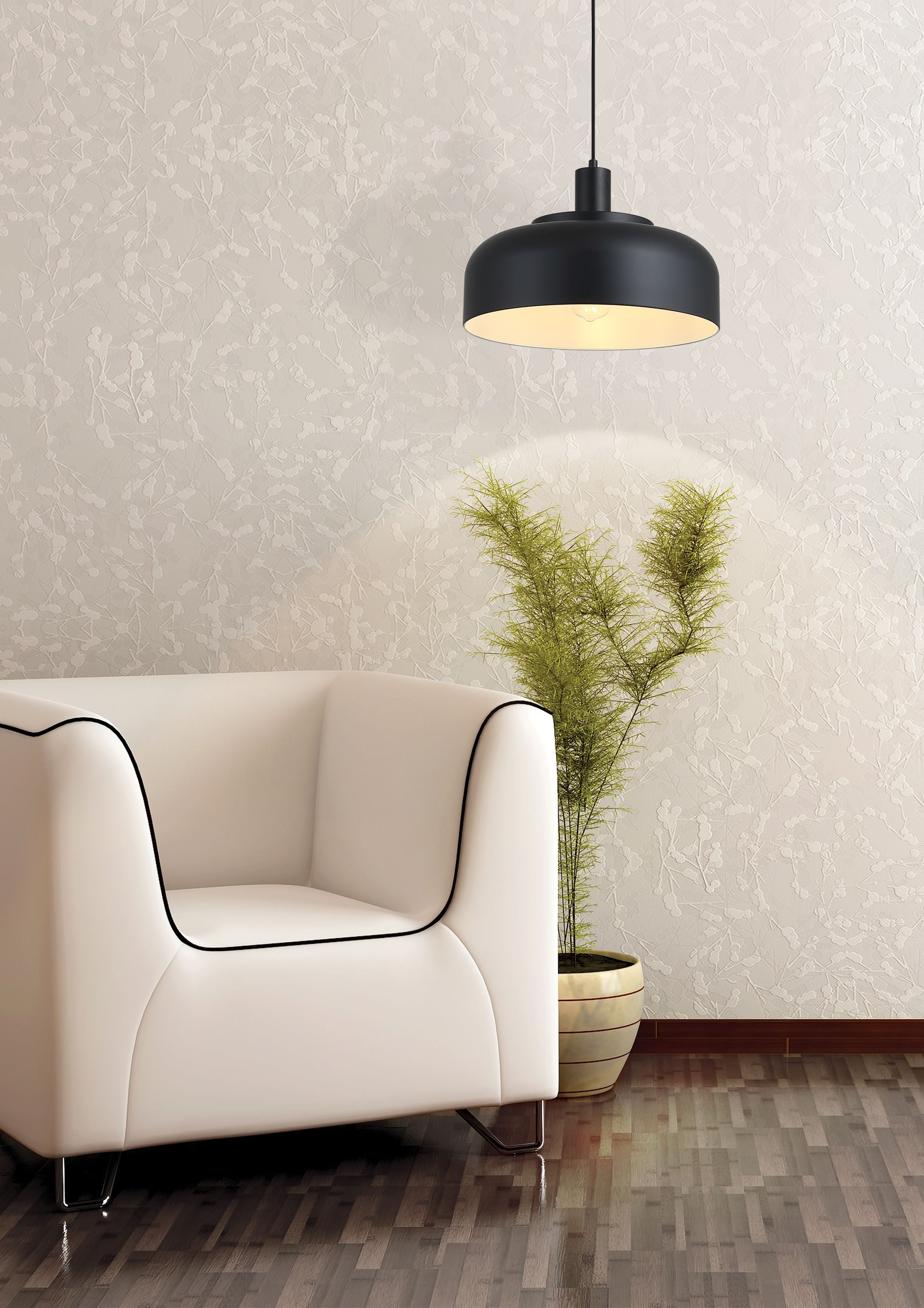 Searchlight Scotland pendant light styled in a living room, hung above a cream armchair and a potted fern, casting a warm glow