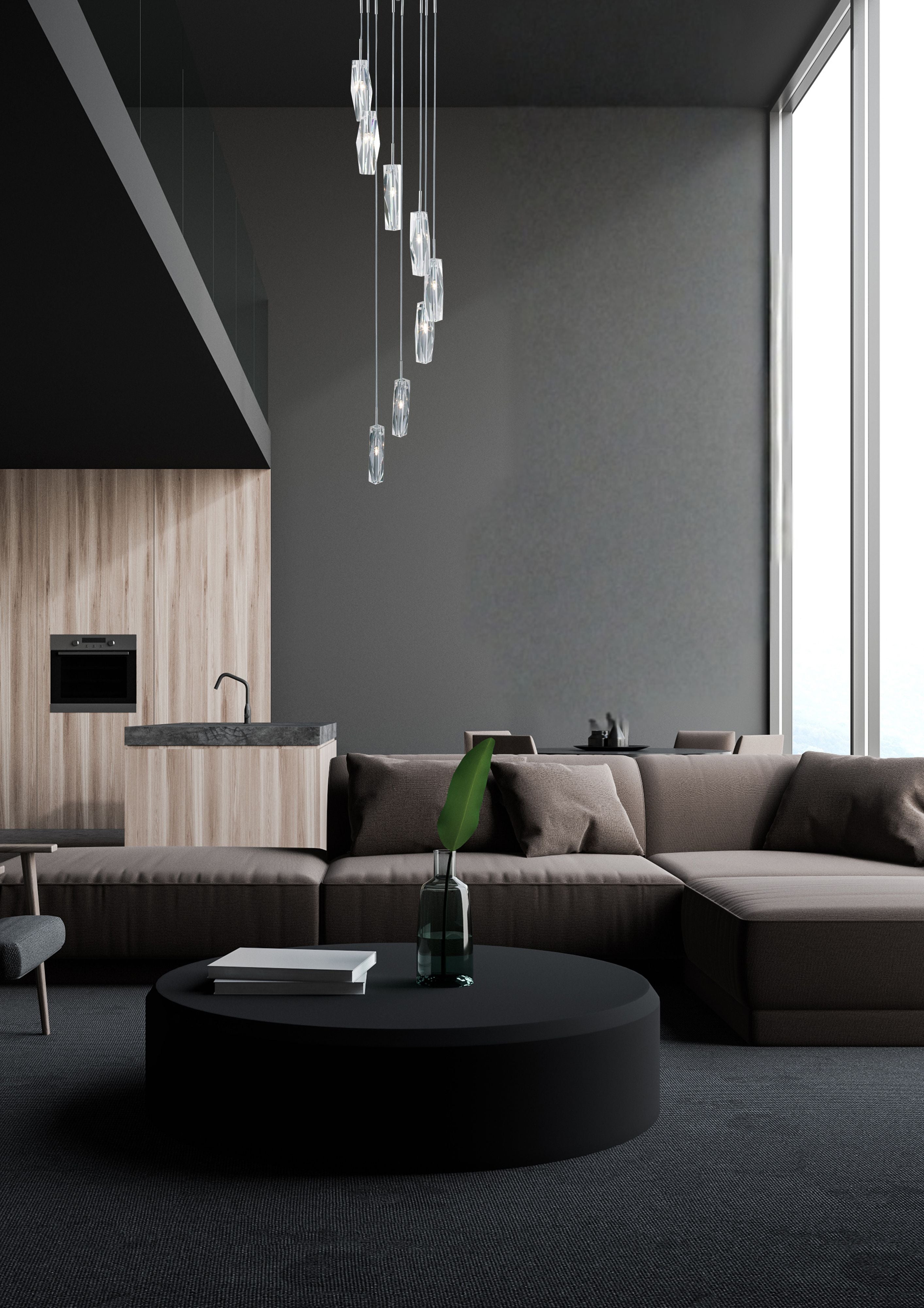 Sculptured Ice Multi-Drop Pendant hanging in a dark modern living room, cascading above a coffee table in front of a wood clad kitchen