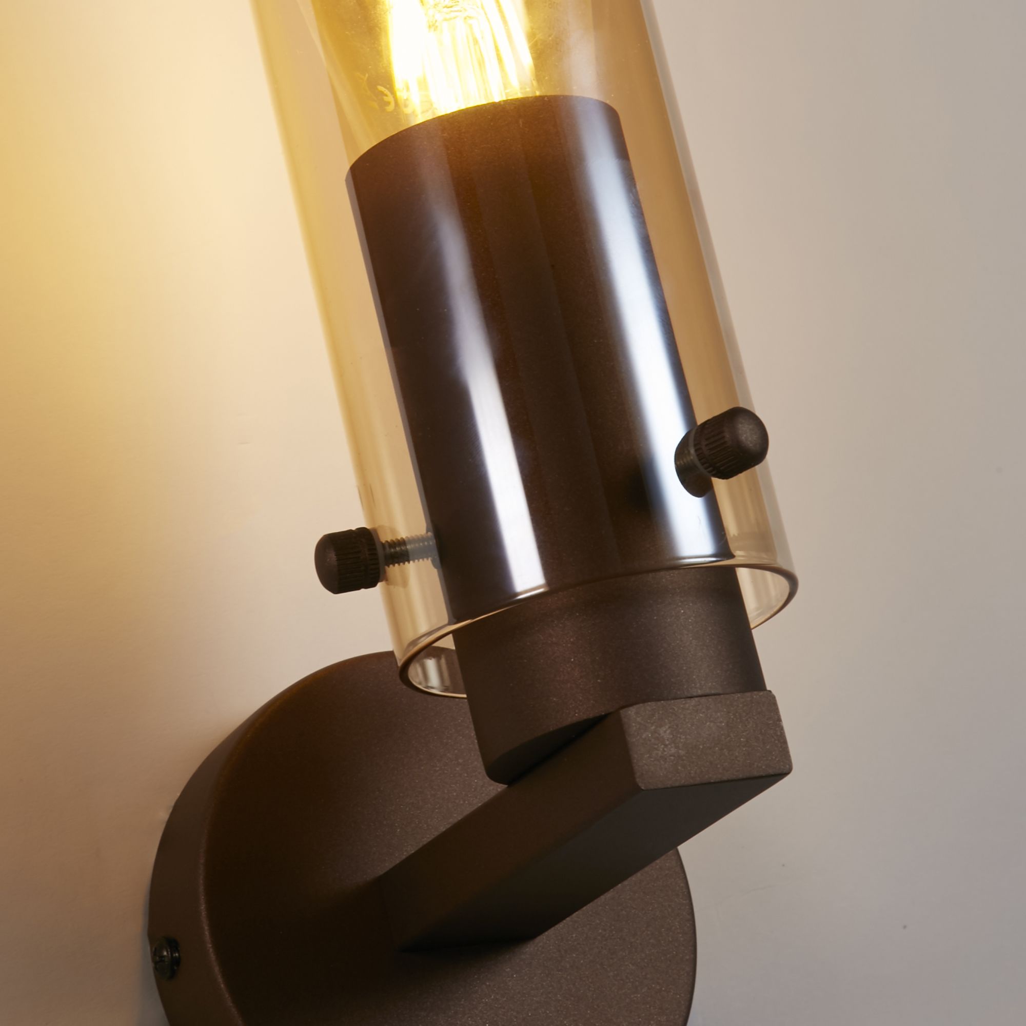 Close up of the mocha metal fitting and pull cord switch on the Searchlight Sweden II 1 light wall light