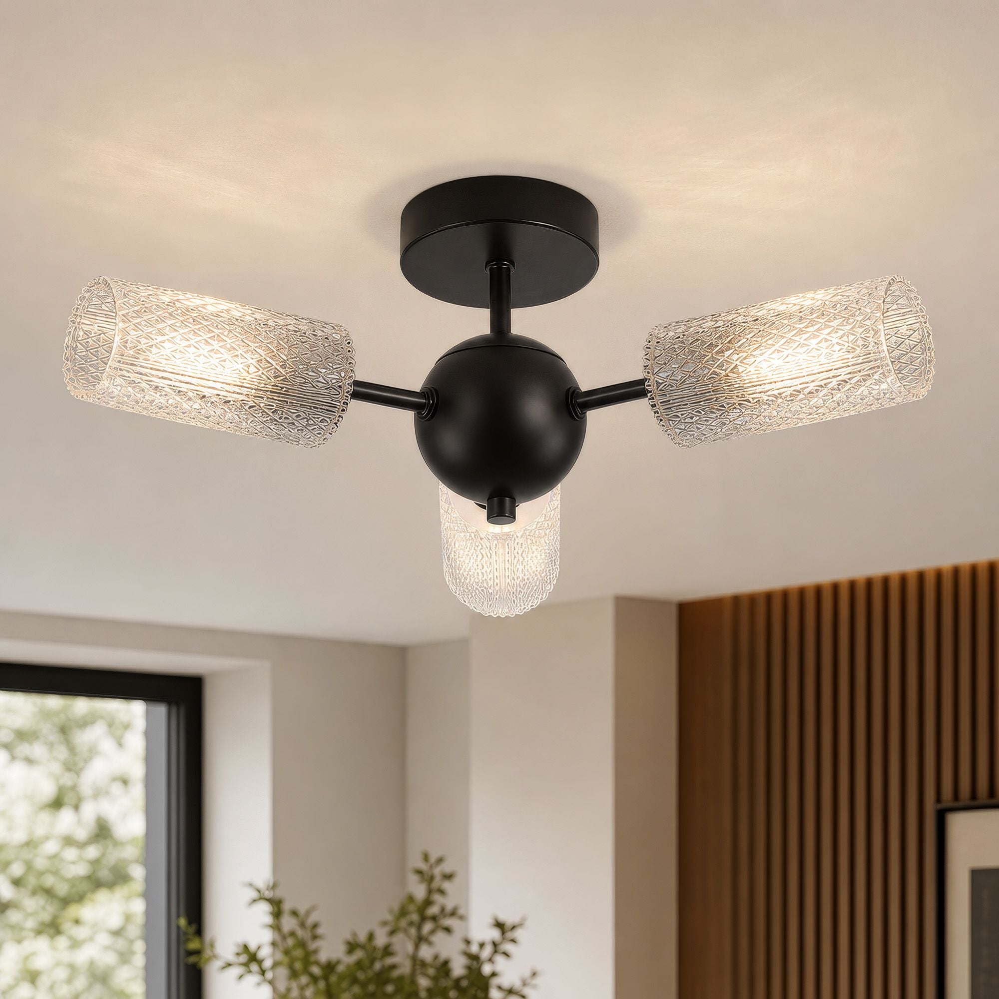 Searchlight Cosmic 3 light semi flush ceiling light styled in a room with wood panelling and a house plant