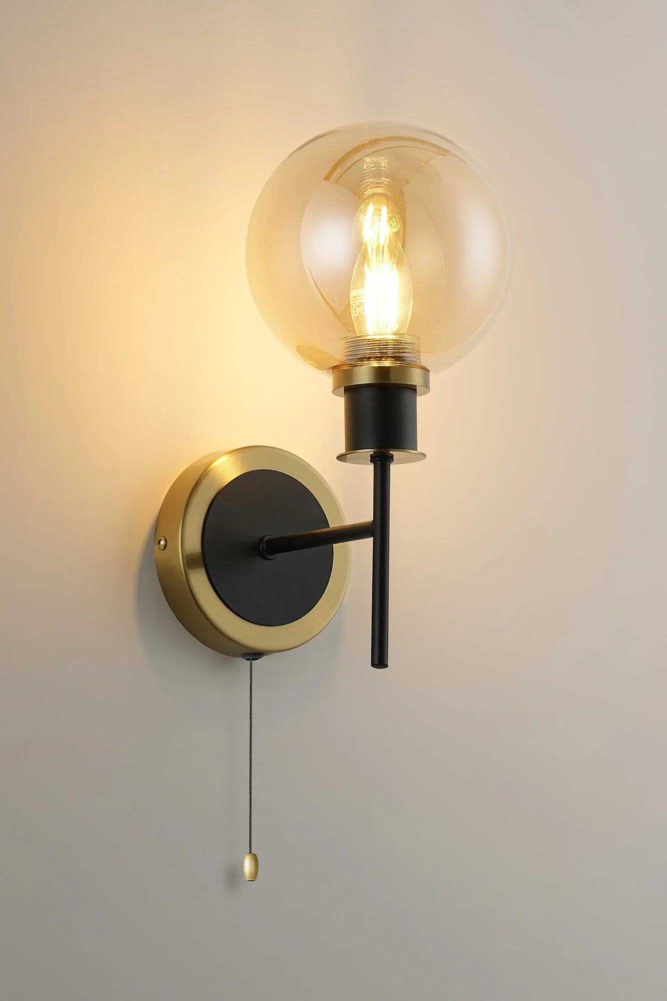 Sycamore Switched Wall Light with 15cm Round Glass Shade - Brass, Amber Plated & Satin Black