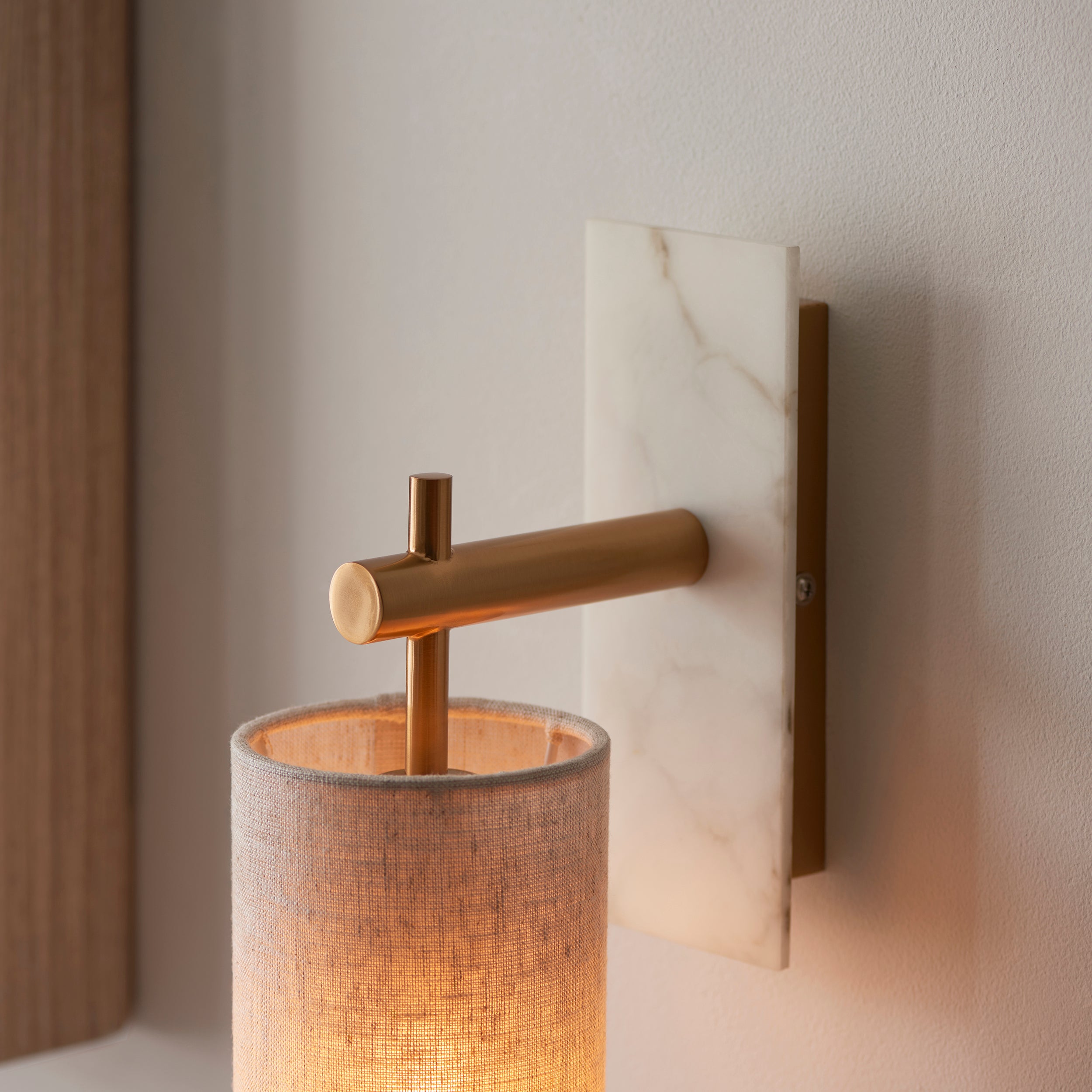 Utopia Spire Single White Marble Wall Light - Vintage Brass & Natural Cylindrical Shade