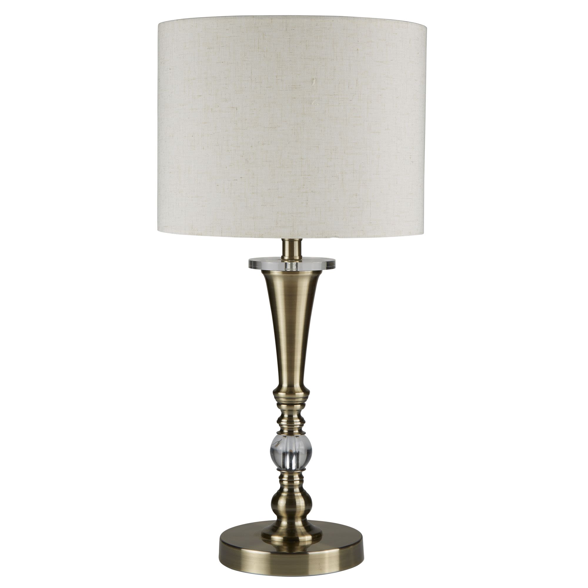 Searchlight Oscar table lamp in antique brass with an oatmeal linen shade, front view with brighter studio lighting