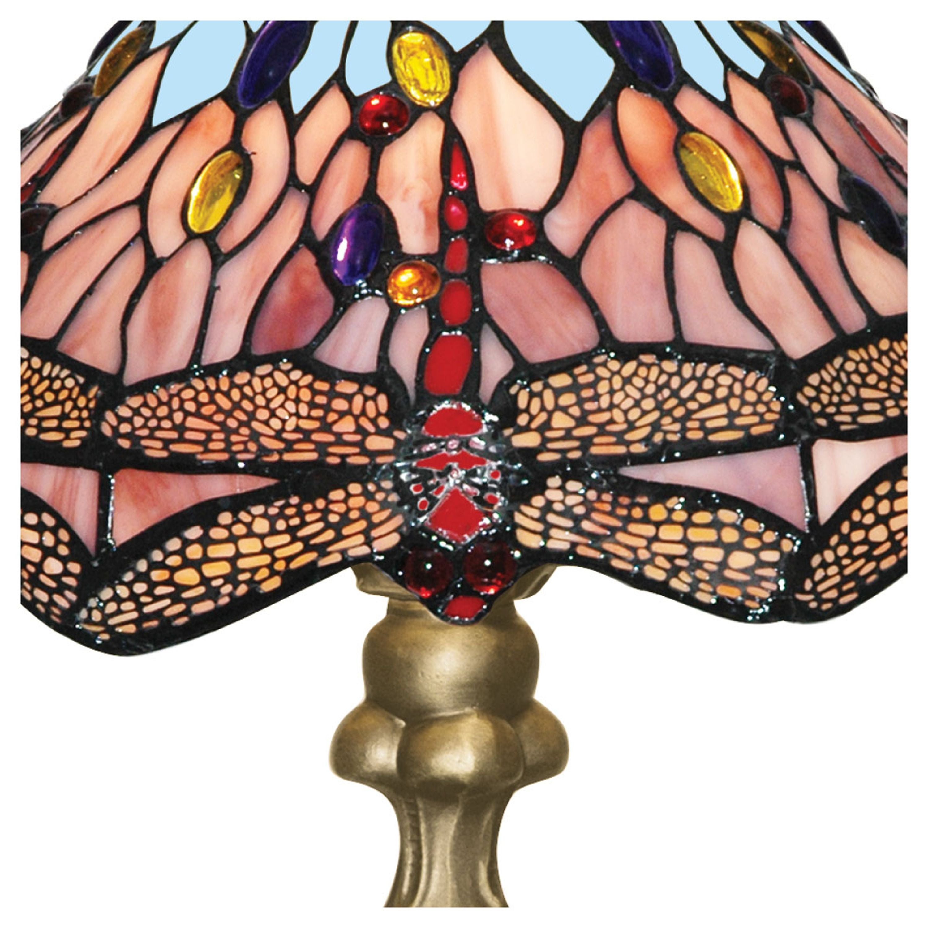 Close up of the Dragonfly table lamp's stained glass shade showing the dragonfly body and wing detail in red, purple and amber glass jewels