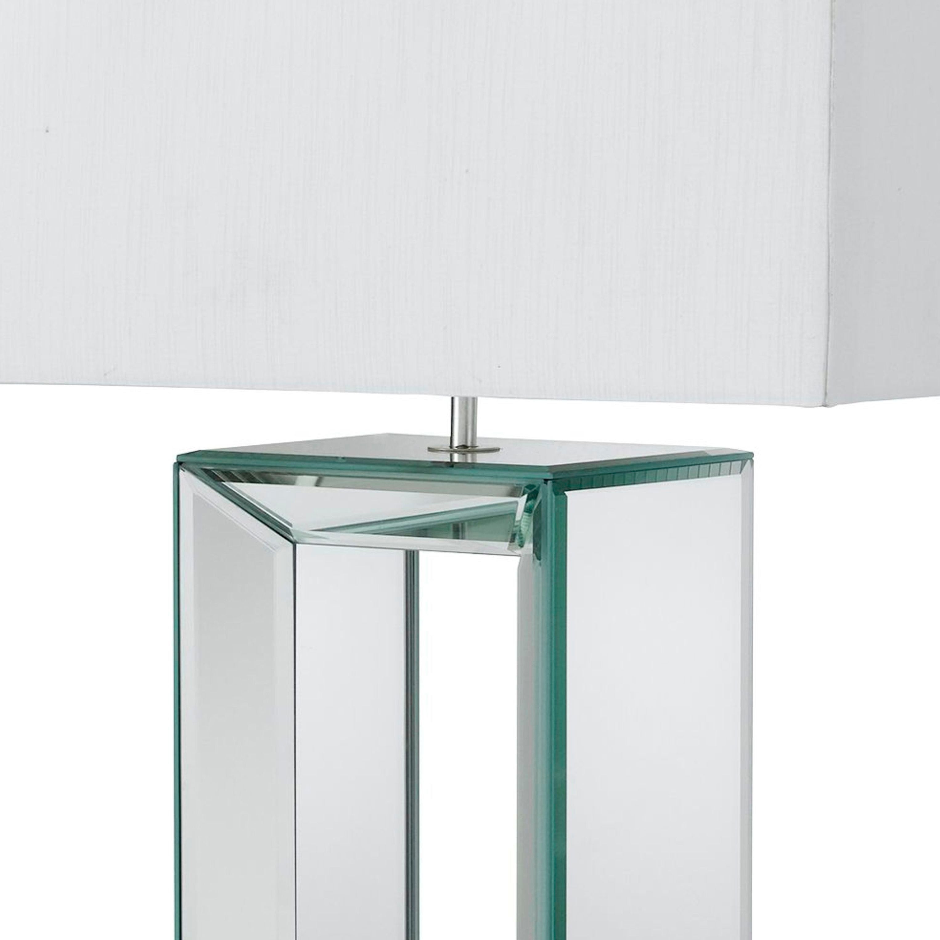 Close up of the mirrored glass base joints on the Searchlight mirror table lamp