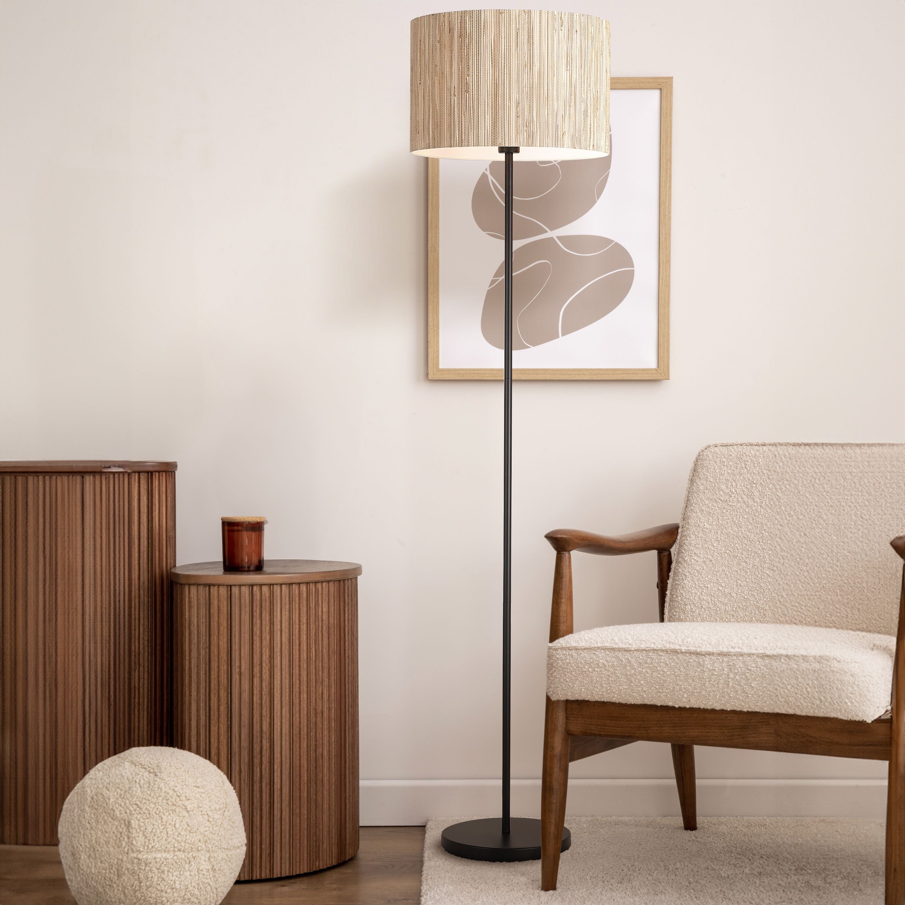 Searchlight Meadow floor lamp styled beside a cream armchair, reeded sideboard and boucle pouffe