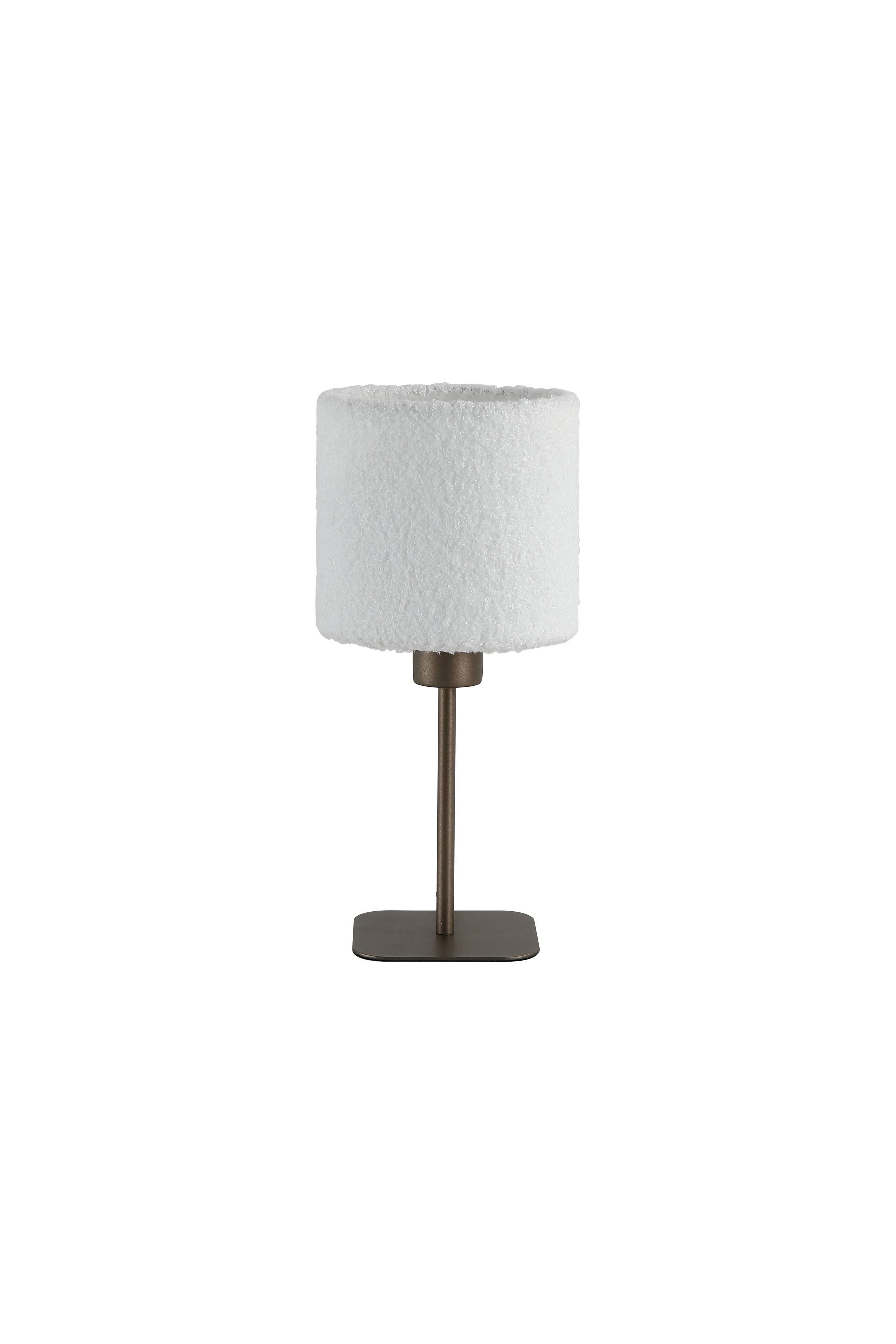 Searchlight Chelsea table lamp viewed from a slight angle, showing the textured looped surface of the ivory plush shade and latte metal base