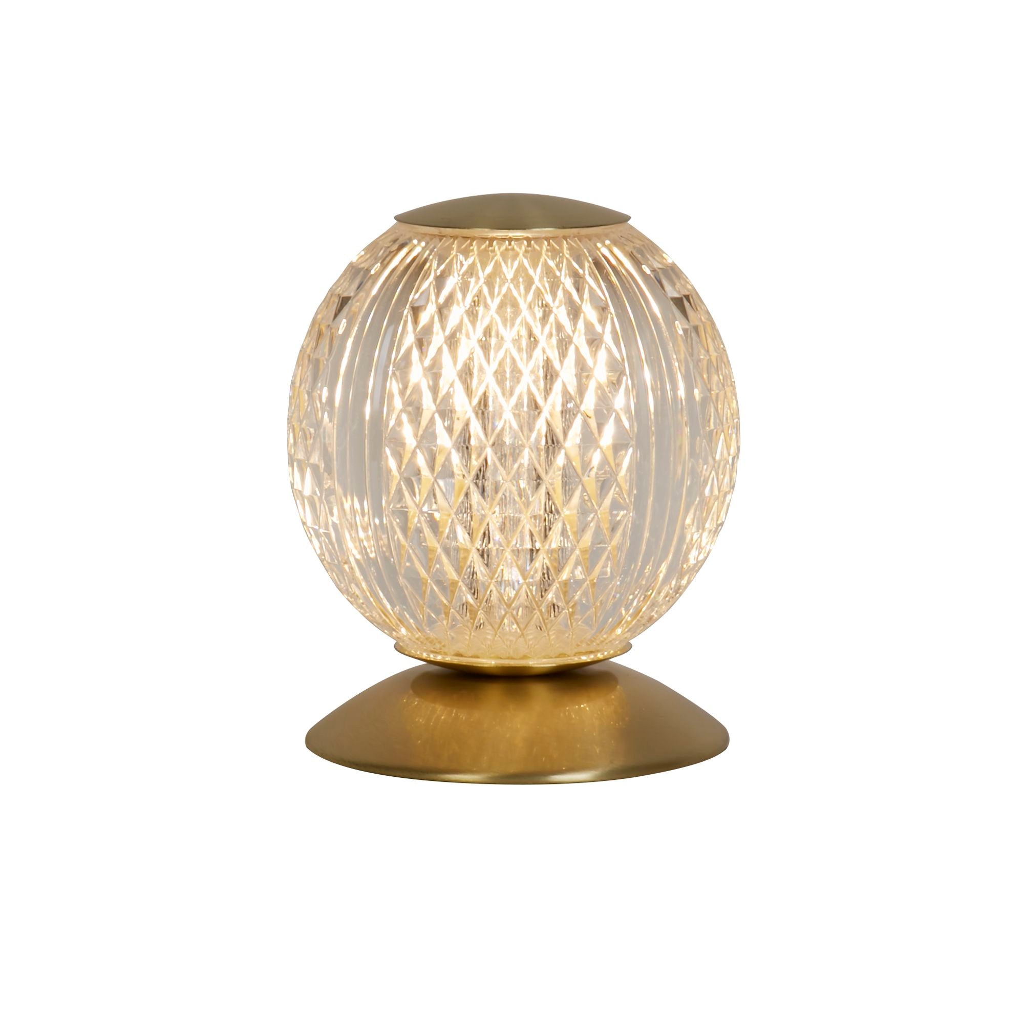 Searchlight Allure table lamp in satin brass, studio shot of the etched acrylic globe shade lit on its round base