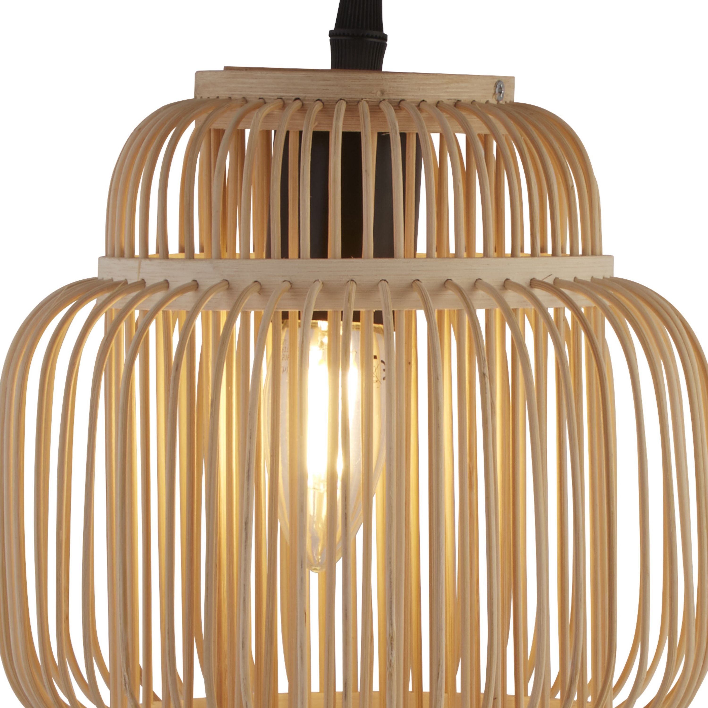 Close up of the Java table lamp's woven bamboo cage shade with the filament bulb glowing inside