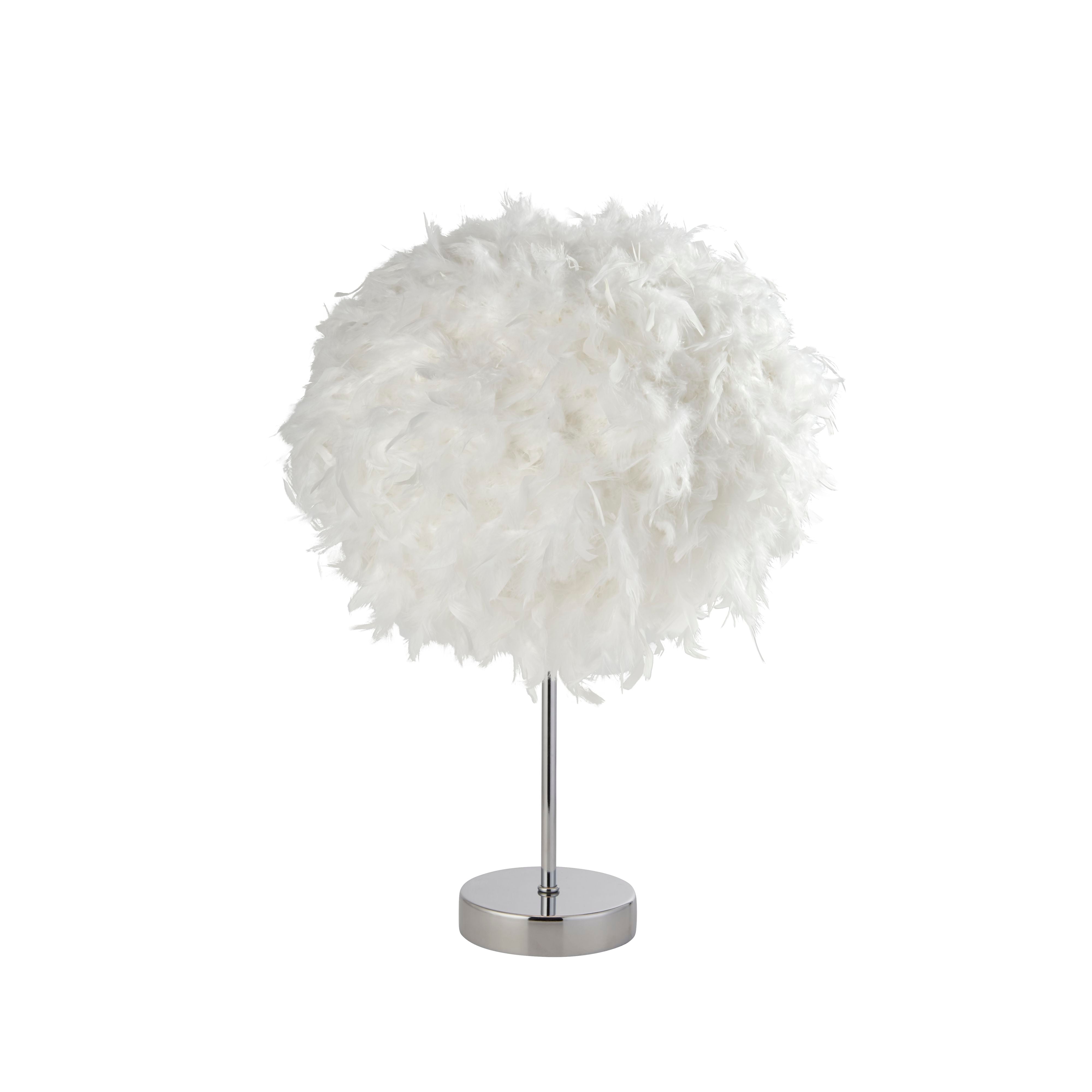 Searchlight Hattie table lamp, alternate angle showing the full white feather shade lit on its chrome base