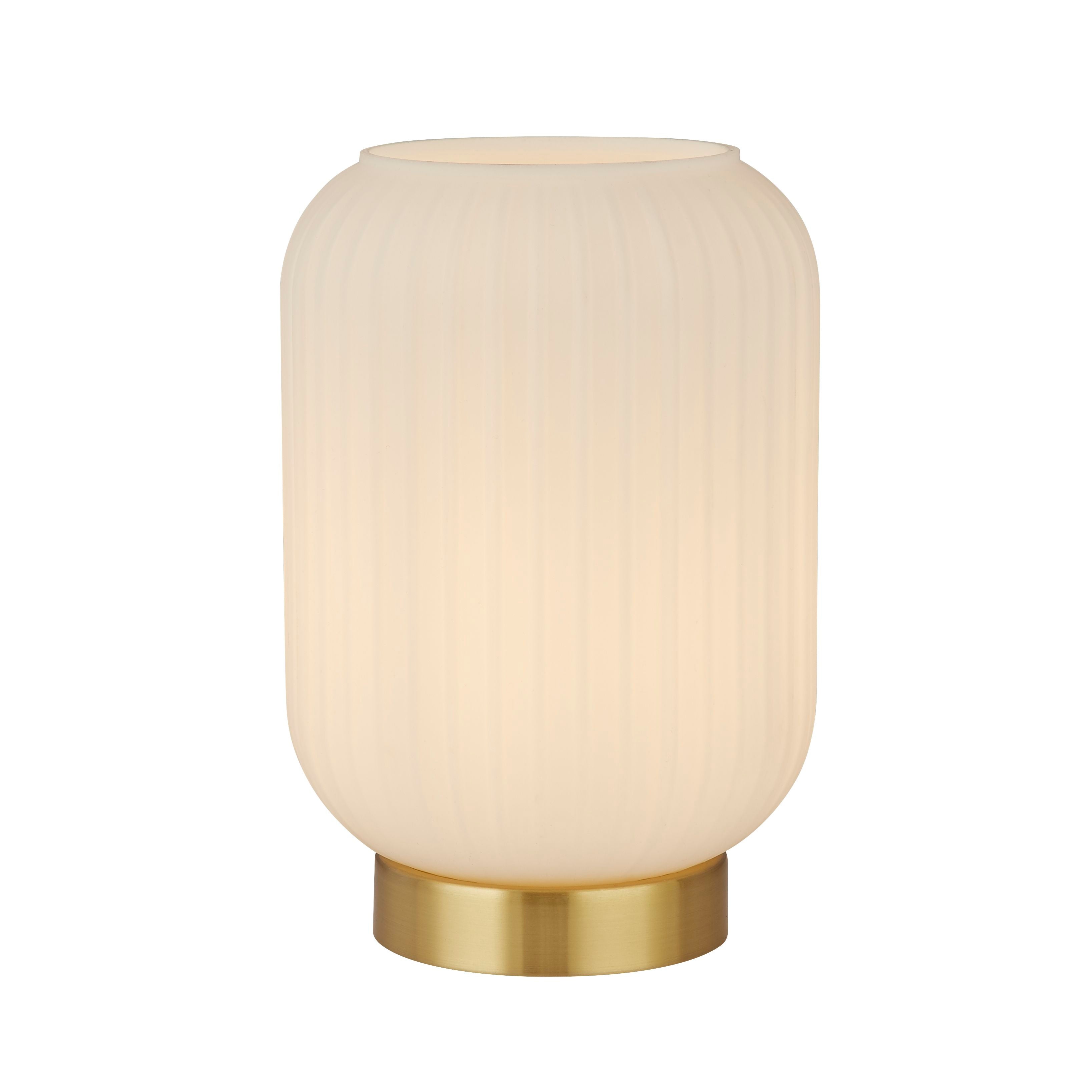 Searchlight Pearl table lamp with a frosted white ribbed glass shade on a satin brass base, studio shot on a white background