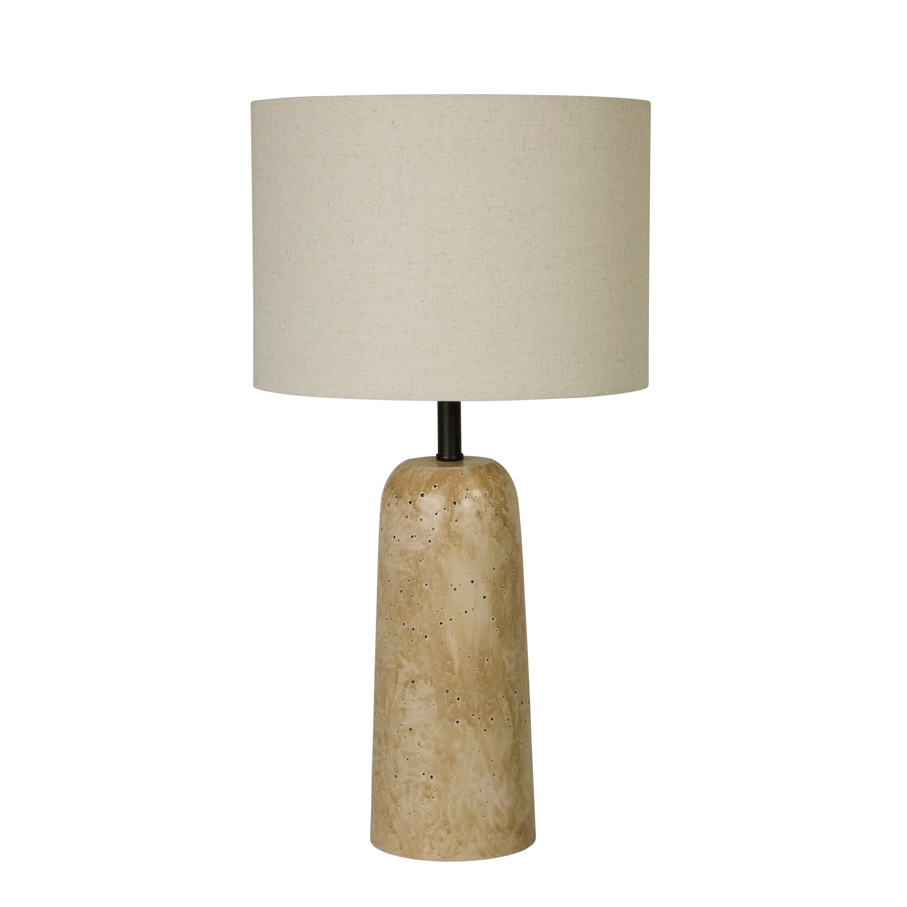 Searchlight Agra table lamp, front view showing the tapered travertine effect base and cream fabric shade