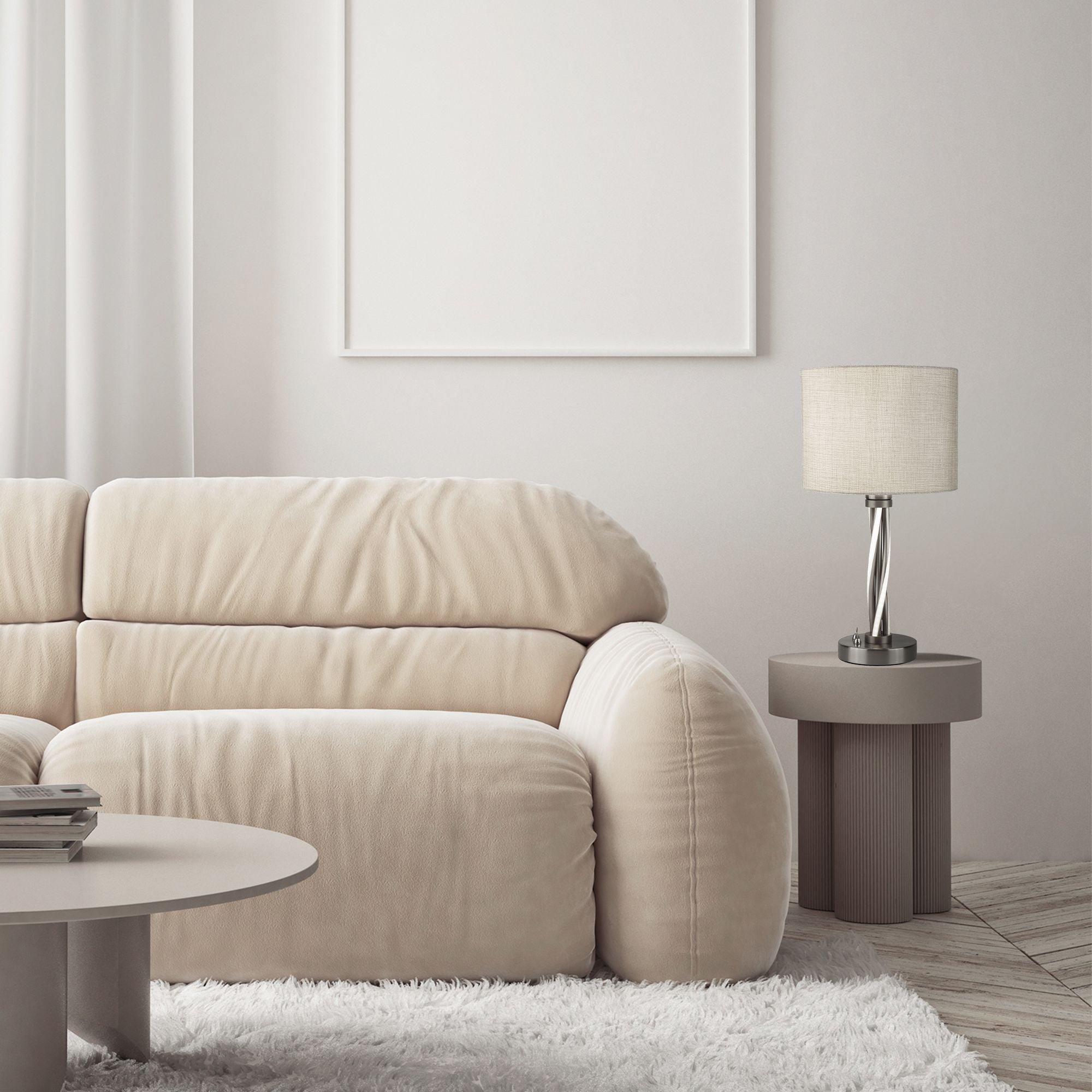 Vegas table lamp with ivory hessian shade styled on a side table beside a beige sofa in a living room