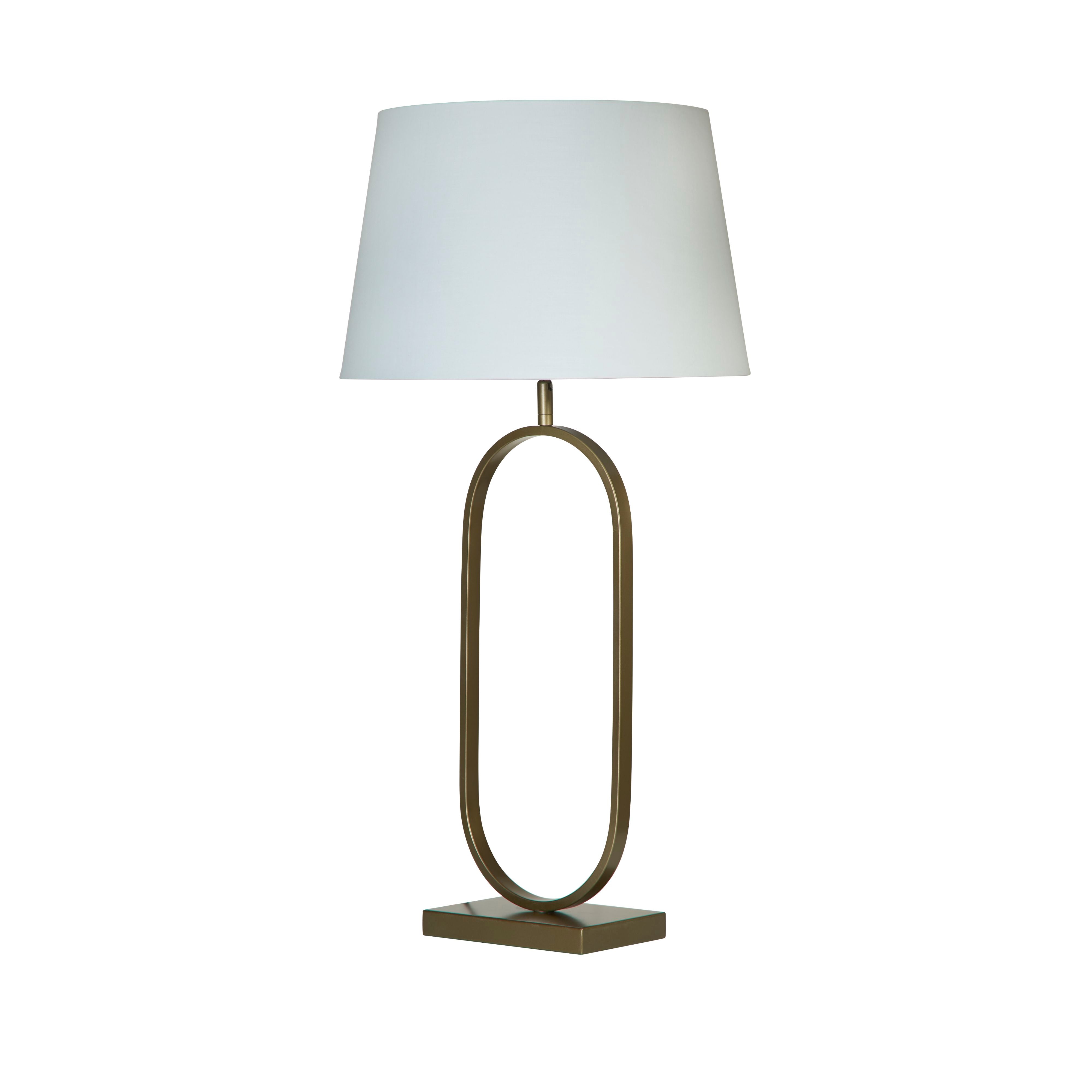 Front view of the bronze oval ring based table lamp with its crisp white cotton shade, on a plain white studio background