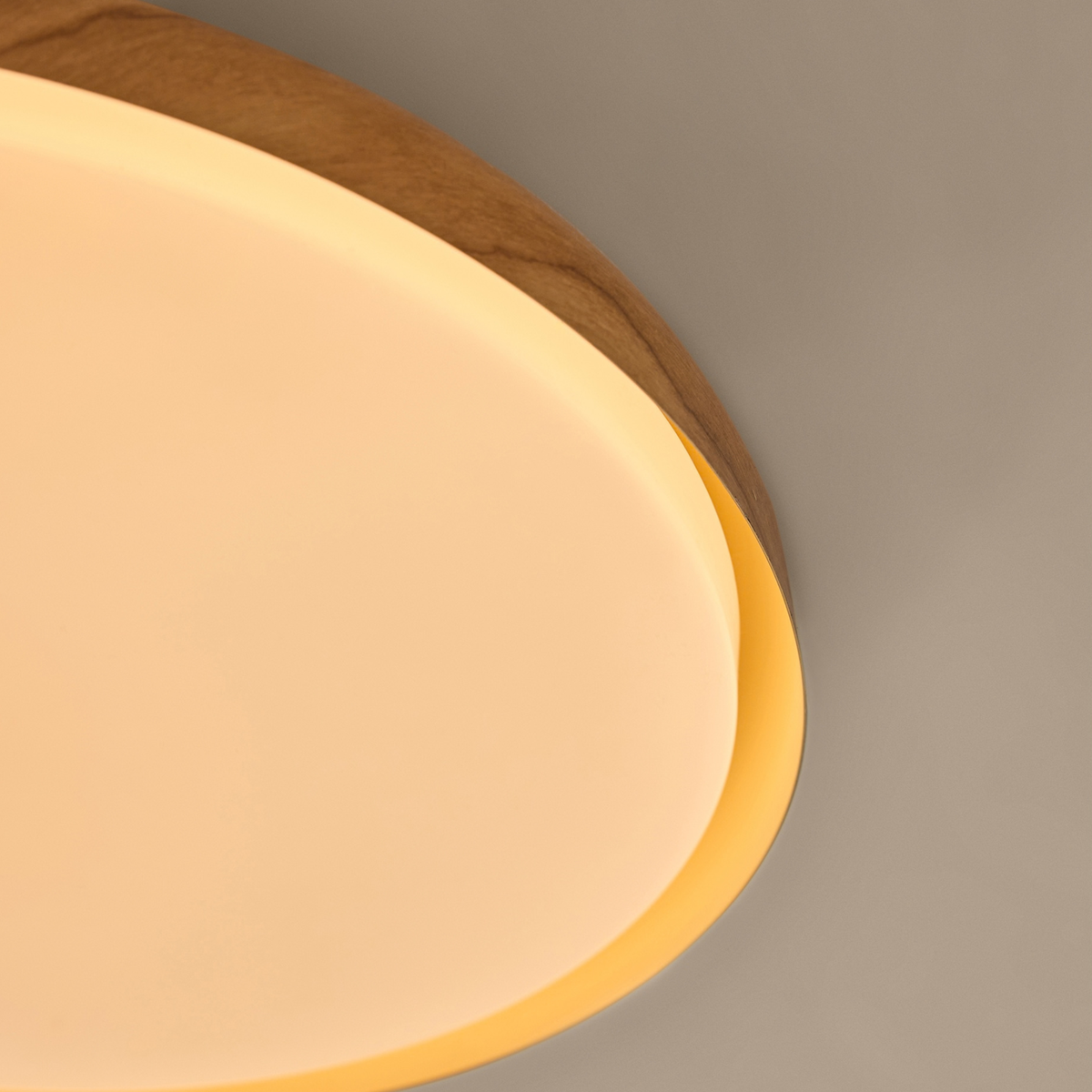 MADE.COM Nura ceiling light opal diffuser and wood effect rim, extreme close up