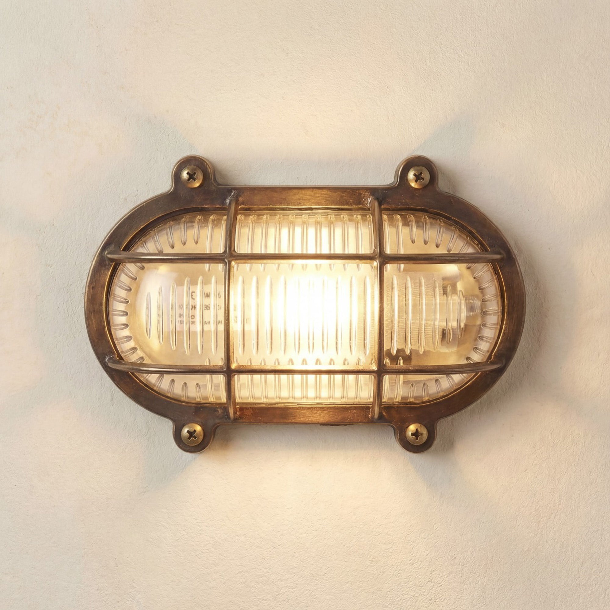 Navigator Merchant Flush Bulkhead Wall Light - Antique Brass