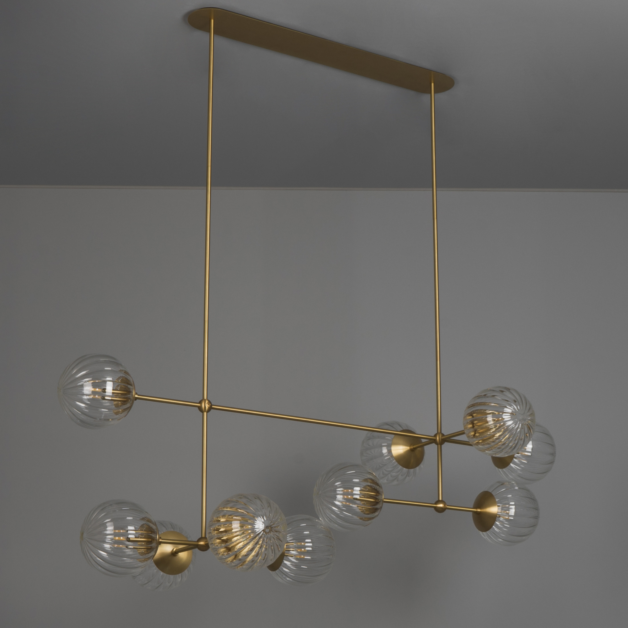 Schwung Armstrong Linear 10 Light Chandelier - Dries Ribbon Glass
