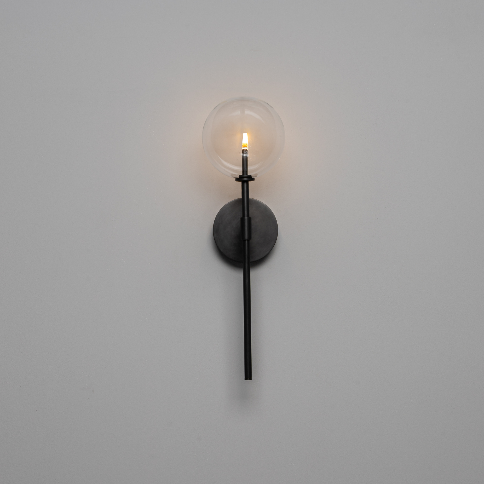 Schwung Dawn Single Wall Sconce Light - Transparent Glass