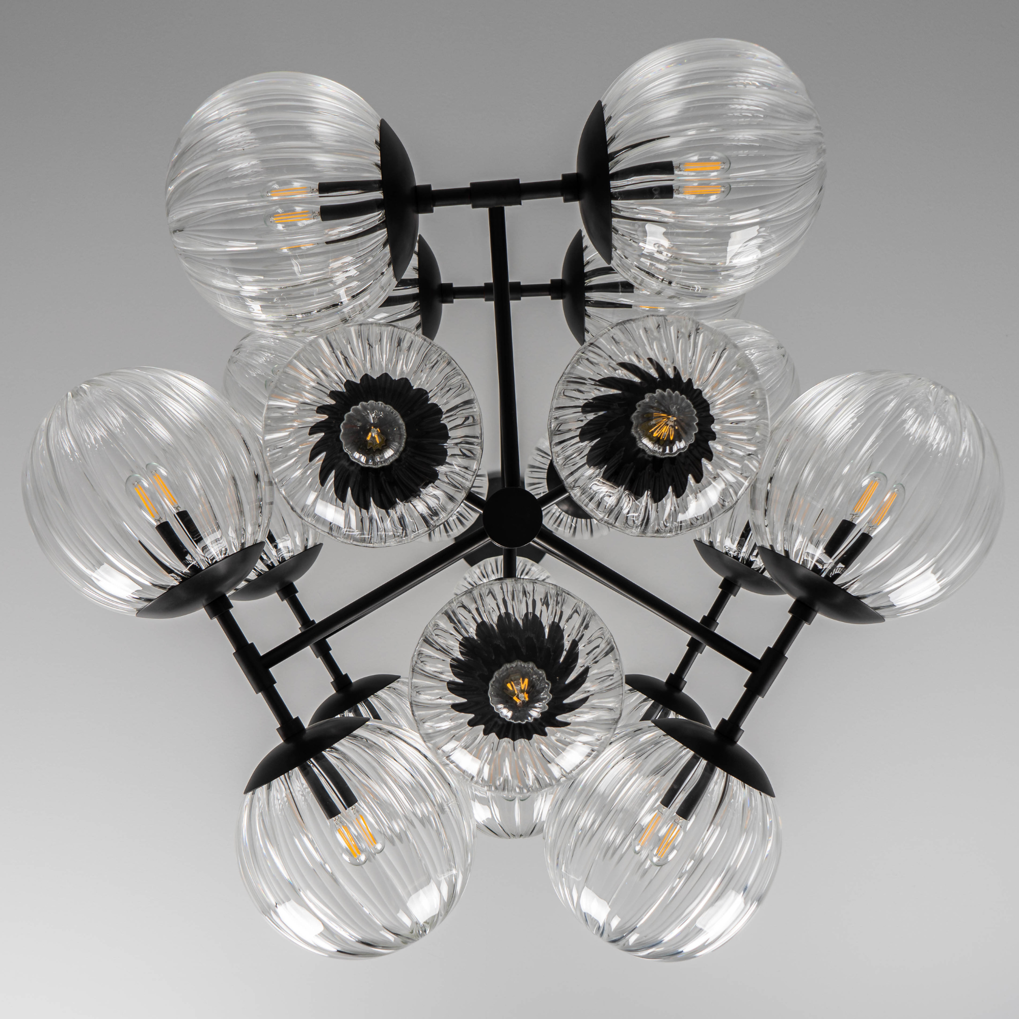 Schwung Glow 21 Light Chandelier - Dries Ribbon Glass
