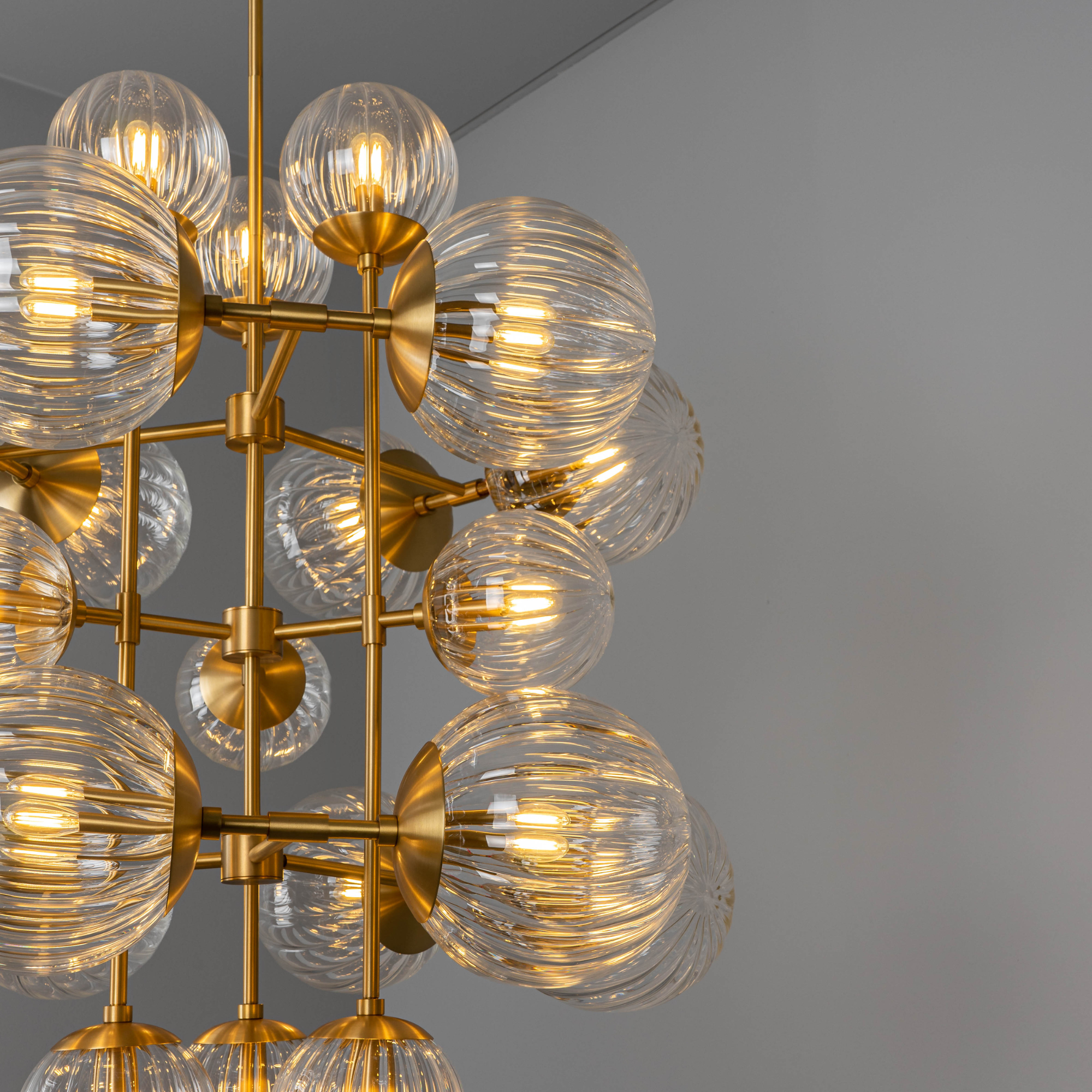 Schwung Glow 21 Light Chandelier - Dries Ribbon Glass