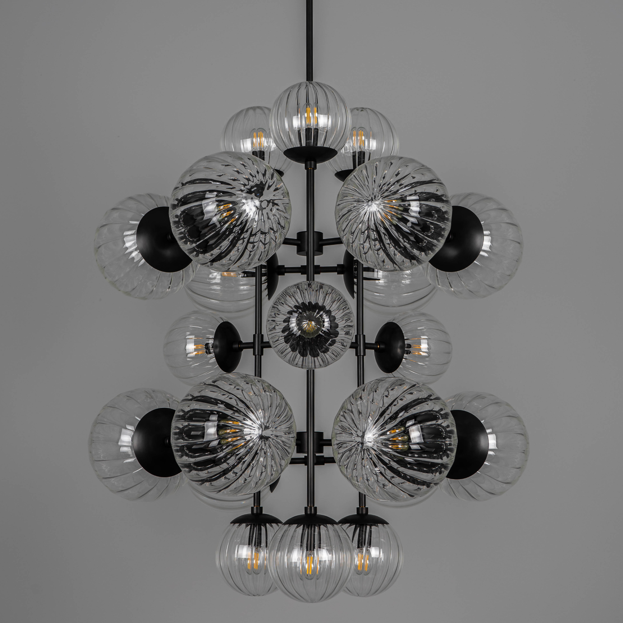 Schwung Glow 21 Light Chandelier - Dries Ribbon Glass