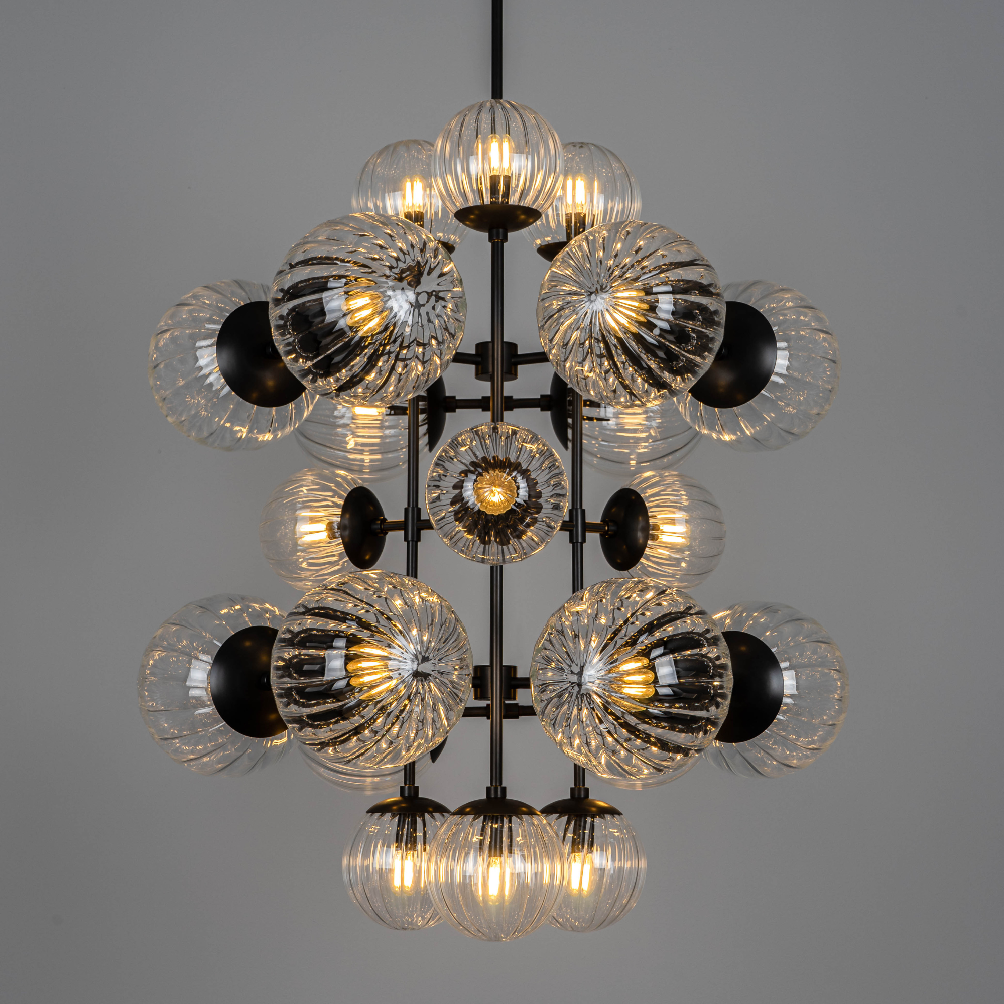 Schwung Glow 21 Light Chandelier - Dries Ribbon Glass