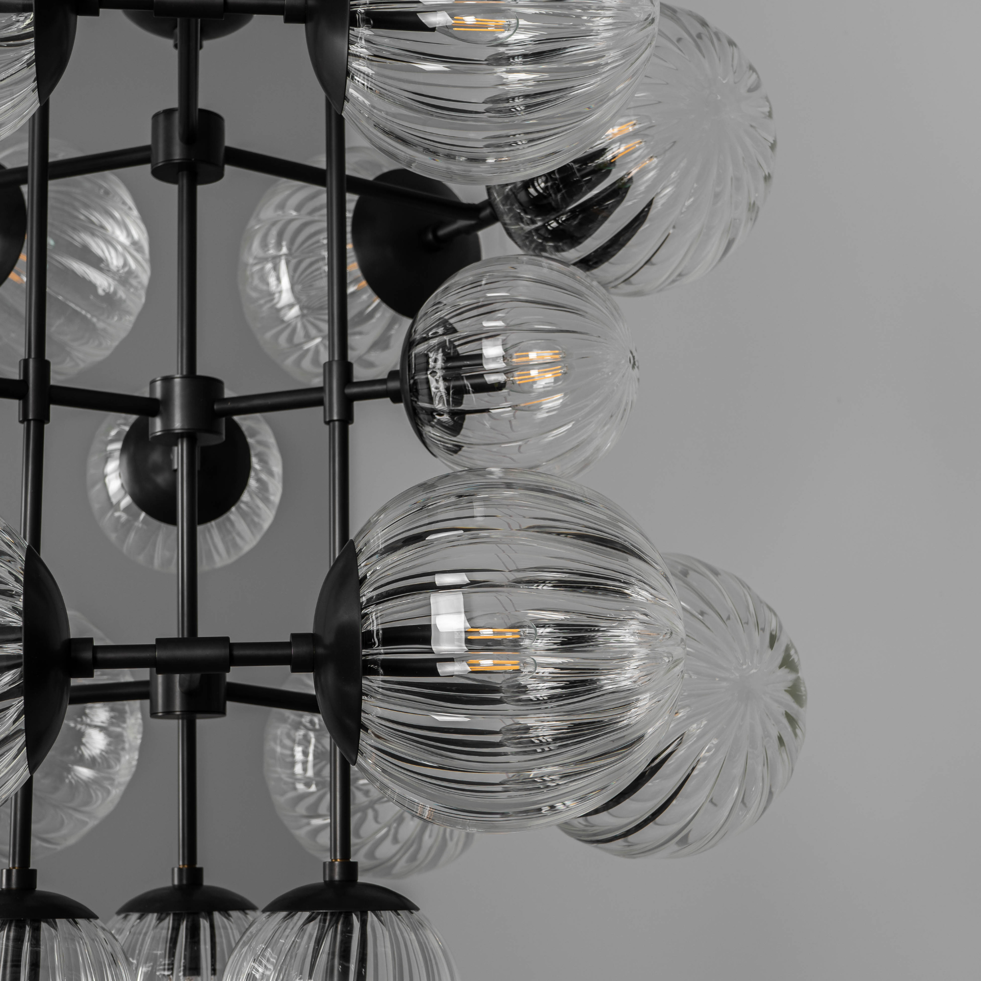 Schwung Glow 21 Light Chandelier - Dries Ribbon Glass