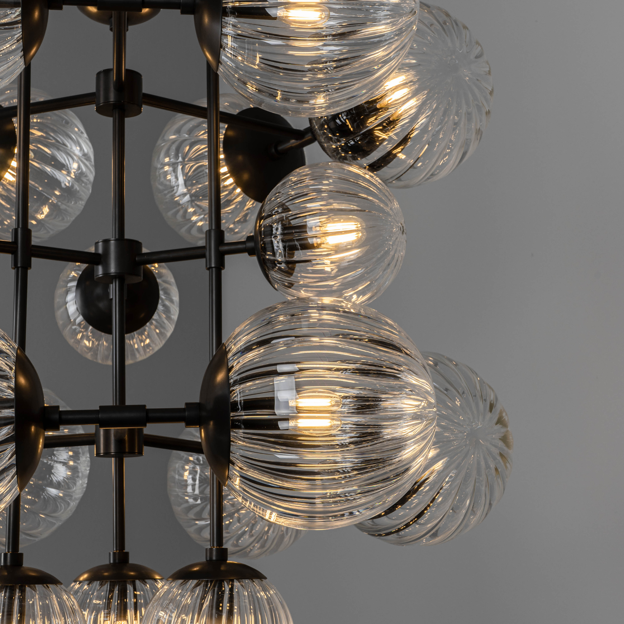 Schwung Glow 21 Light Chandelier - Dries Ribbon Glass