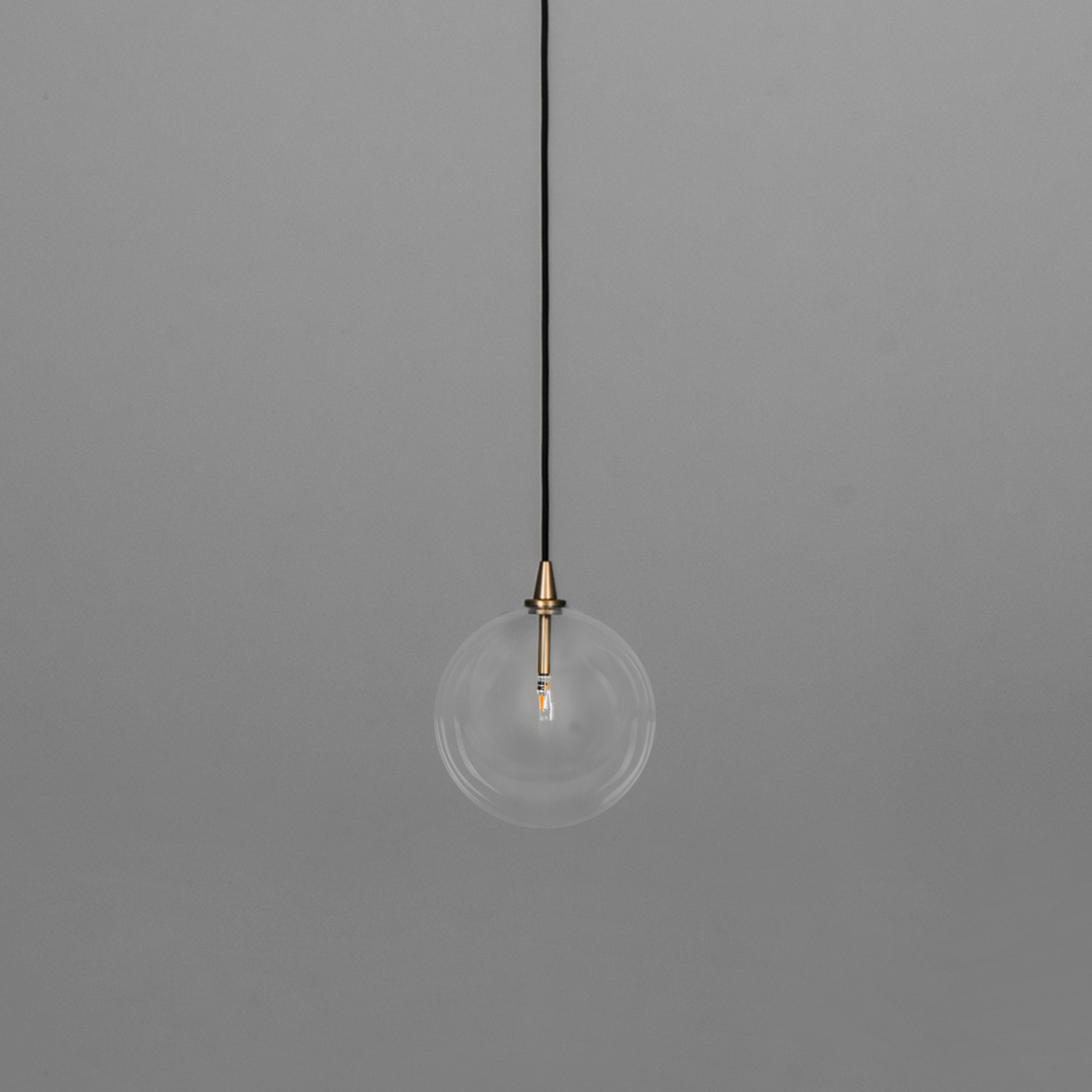 Schwung Glass Globe Single Pendant - Transparent Glass