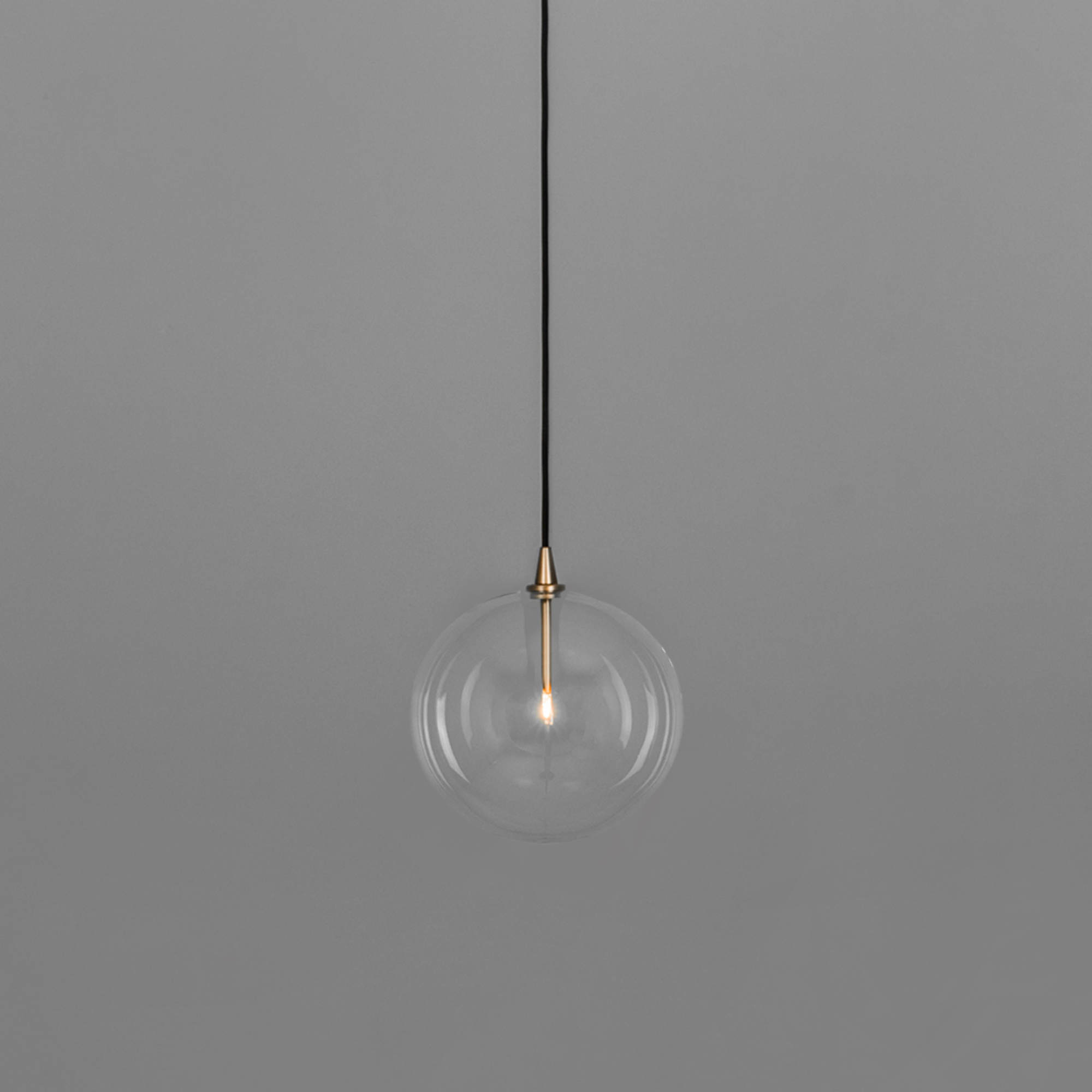 Schwung Glass Globe Single Pendant - Transparent Glass
