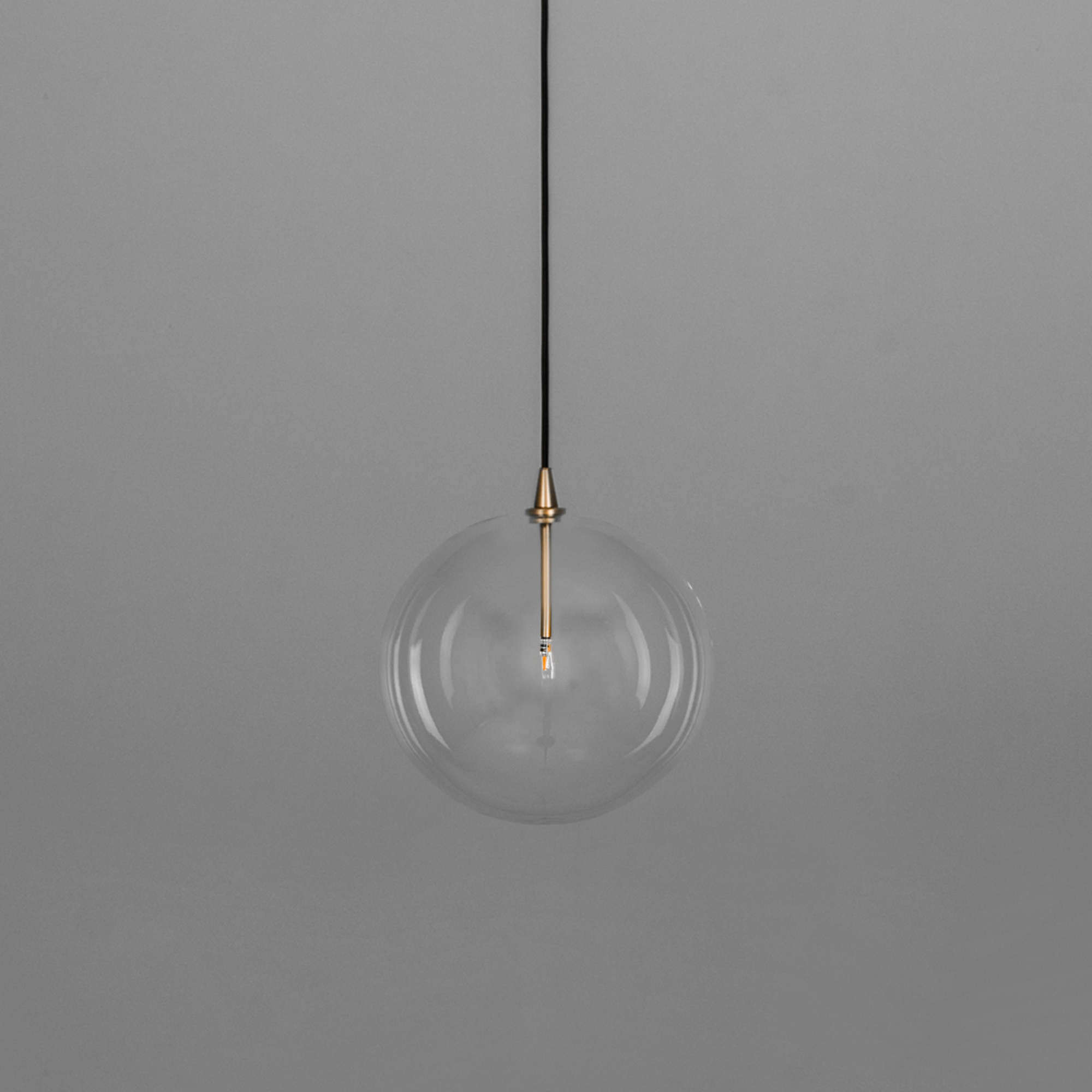 Schwung Glass Globe Single Pendant - Transparent Glass