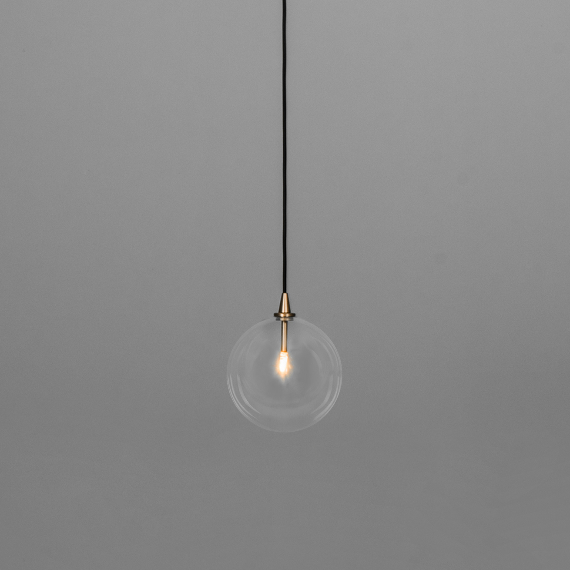Schwung Glass Globe Single Pendant - Transparent Glass