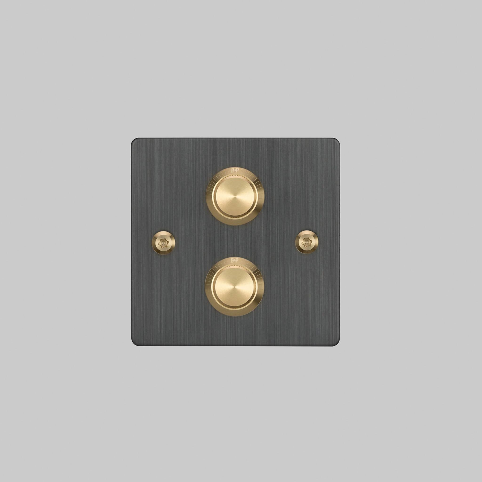 Buster + Punch 2G dimmer switch, smoked bronze plate with brass linear knurl knobs, front elevation