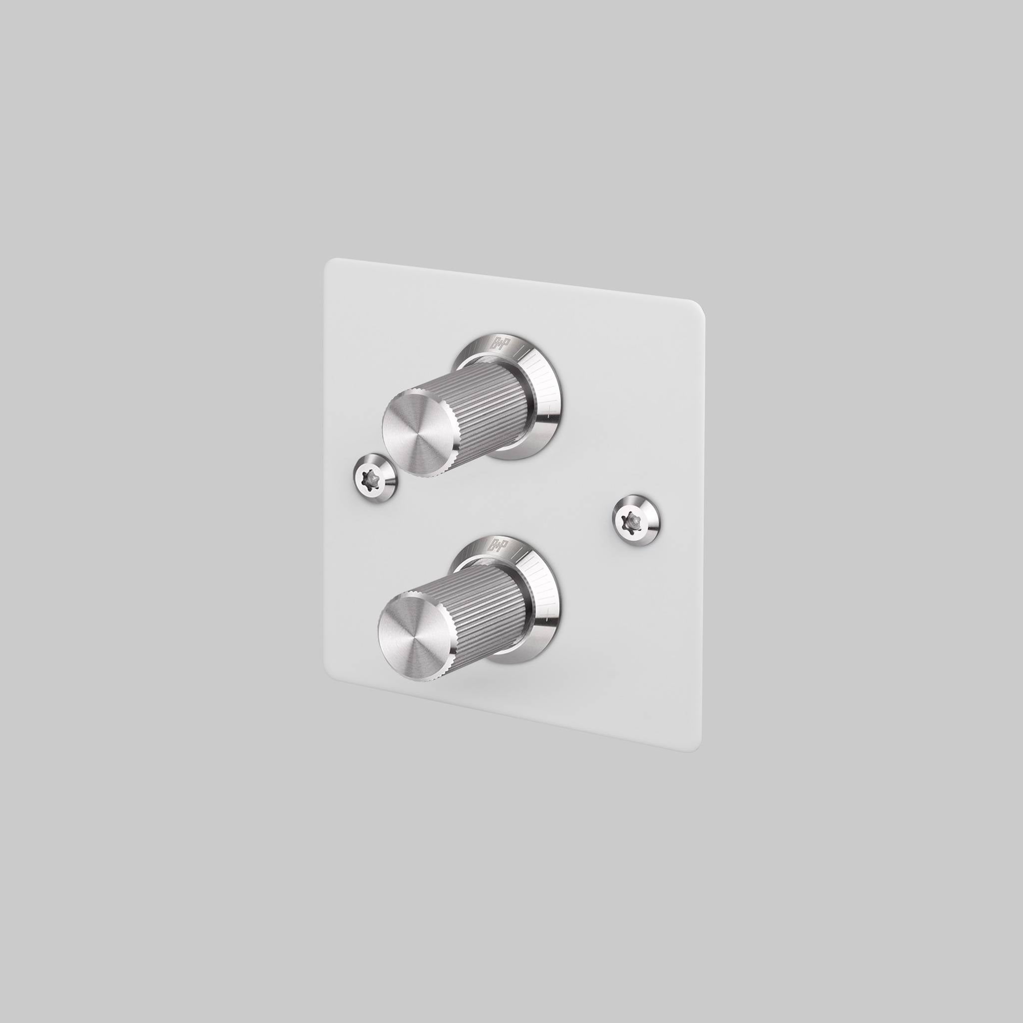 Buster + Punch 2G dimmer switch, white plate with steel linear knurl knob, front view