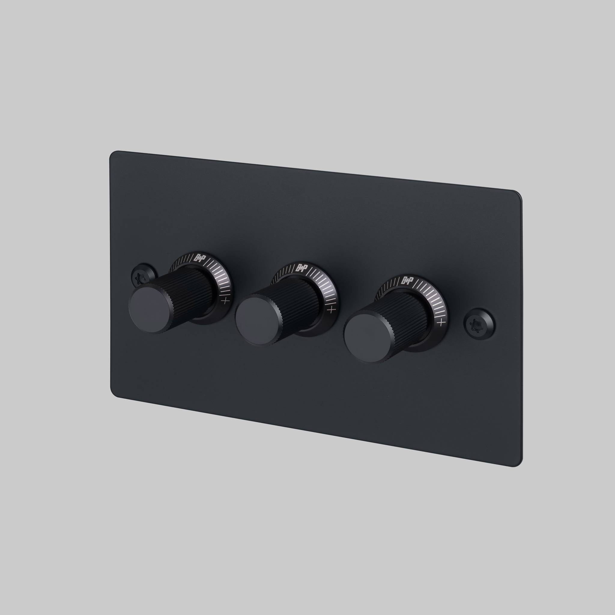Buster + Punch 3G dimmer switch, black plate with black linear knurl knobs, front view