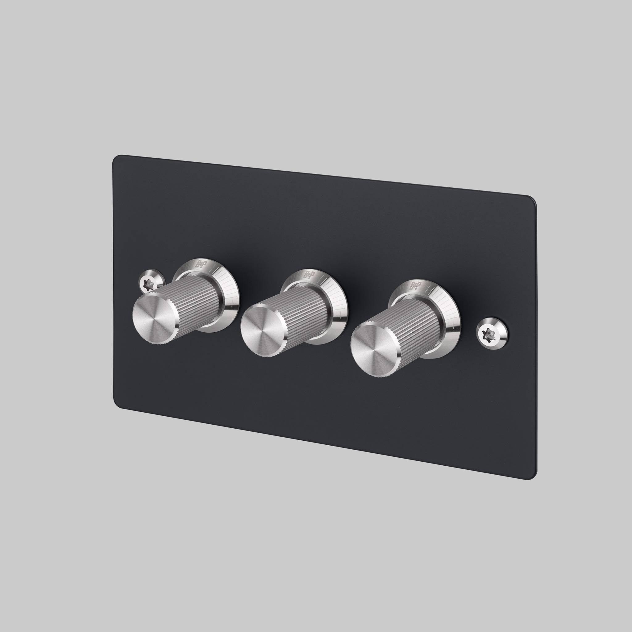 Buster + Punch 3G dimmer switch, black plate with steel linear knurl knobs, front view