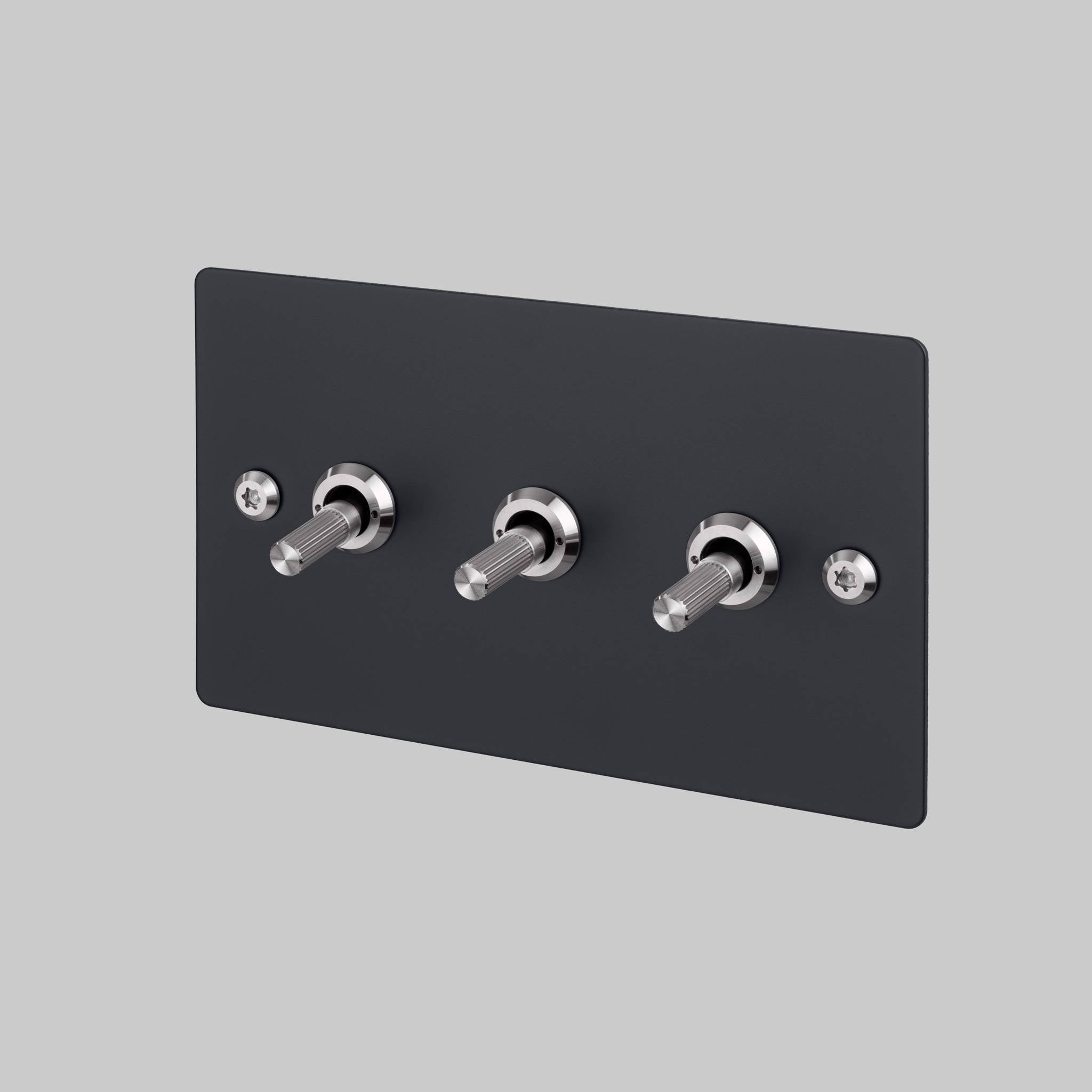 Buster + Punch 3G toggle switch, Black plate with Steel linear knurl toggle arm, front angled view