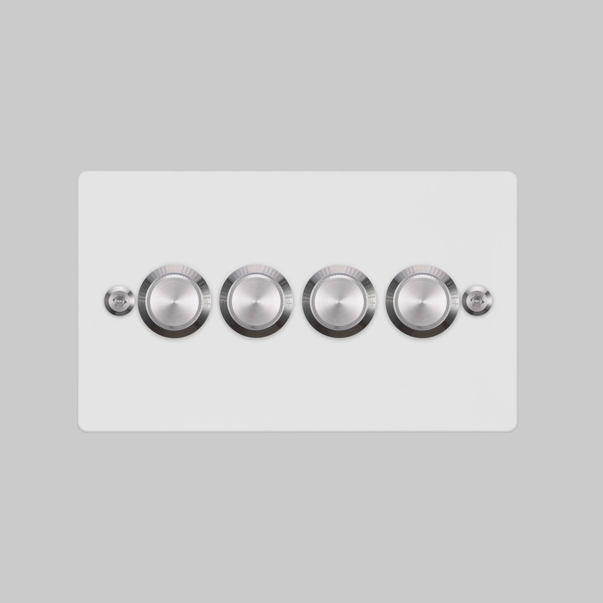 Buster + Punch 4G dimmer switch, white plate with steel linear knurl knobs, elevated angle view