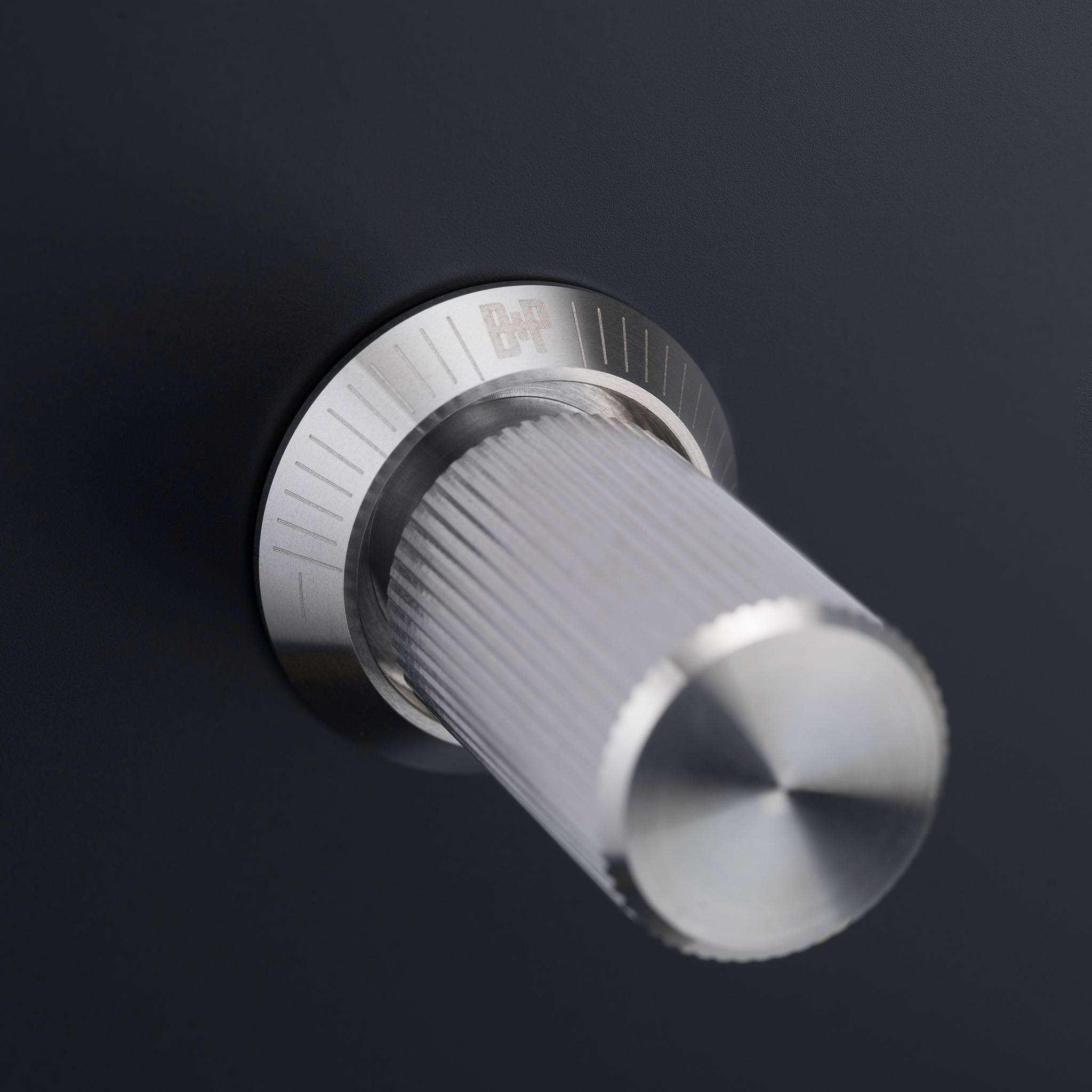 Buster + Punch 1G dimmer switch, close up of the steel linear knurl knob detail