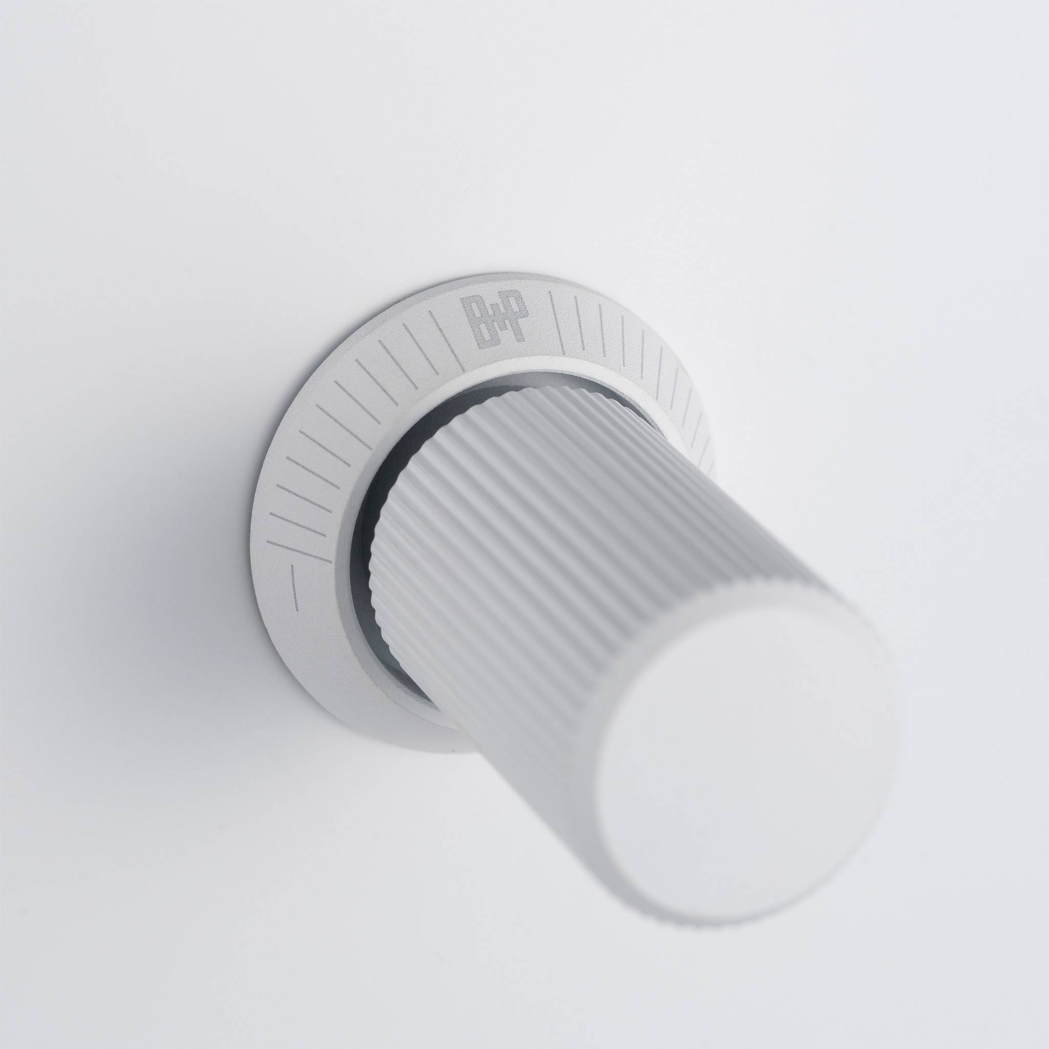Buster + Punch 3G dimmer switch, close up of the White linear knurl knob detail